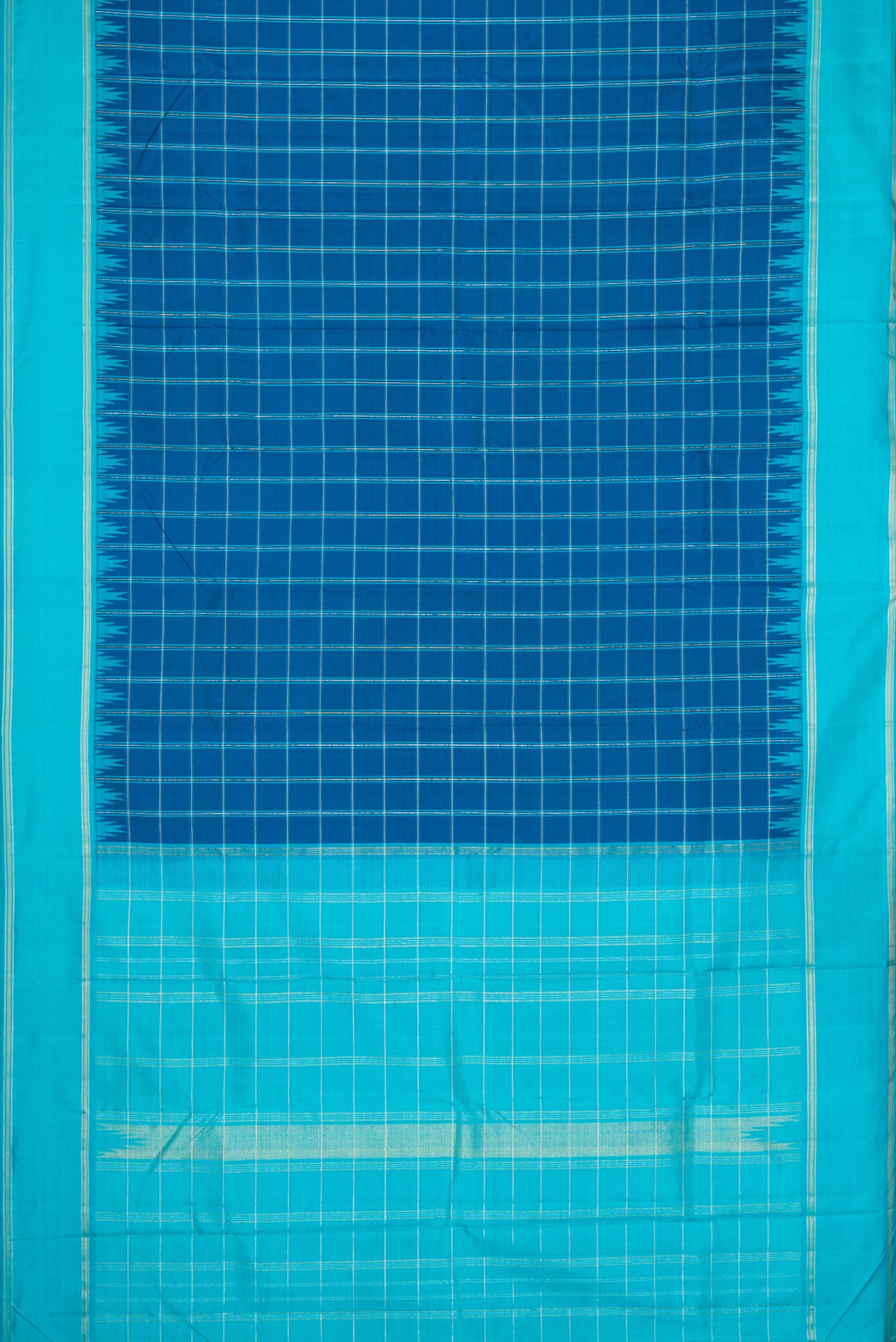 Flat view of Pure Silk Pure Zari Peacock Blue Dual Tone Kanjivaram Saree with Checked design on the body and Zari Border. 