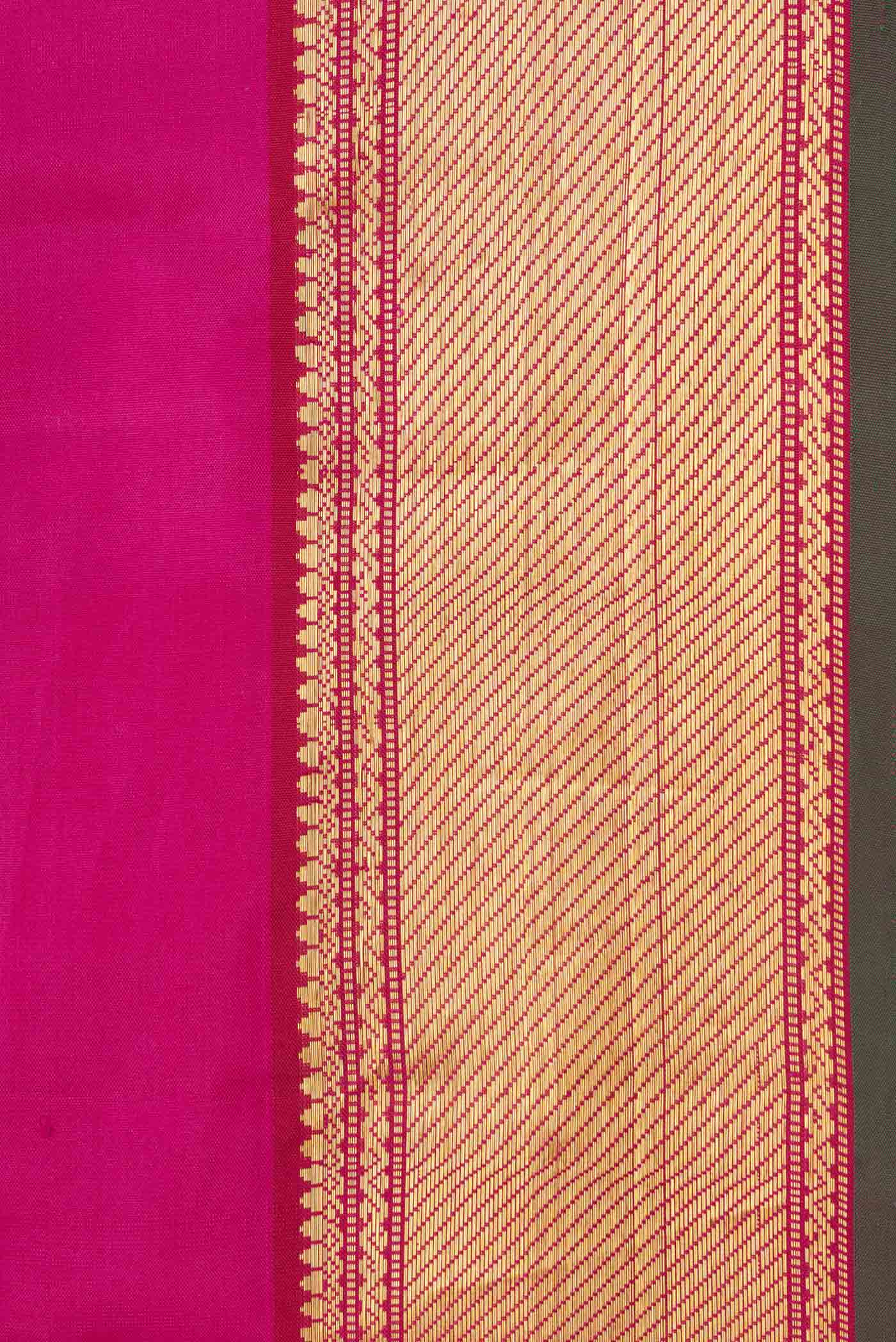 Border image of Pink Dual Tone Kanchipuram Silk Saree with Plain Body and Zari Border. 