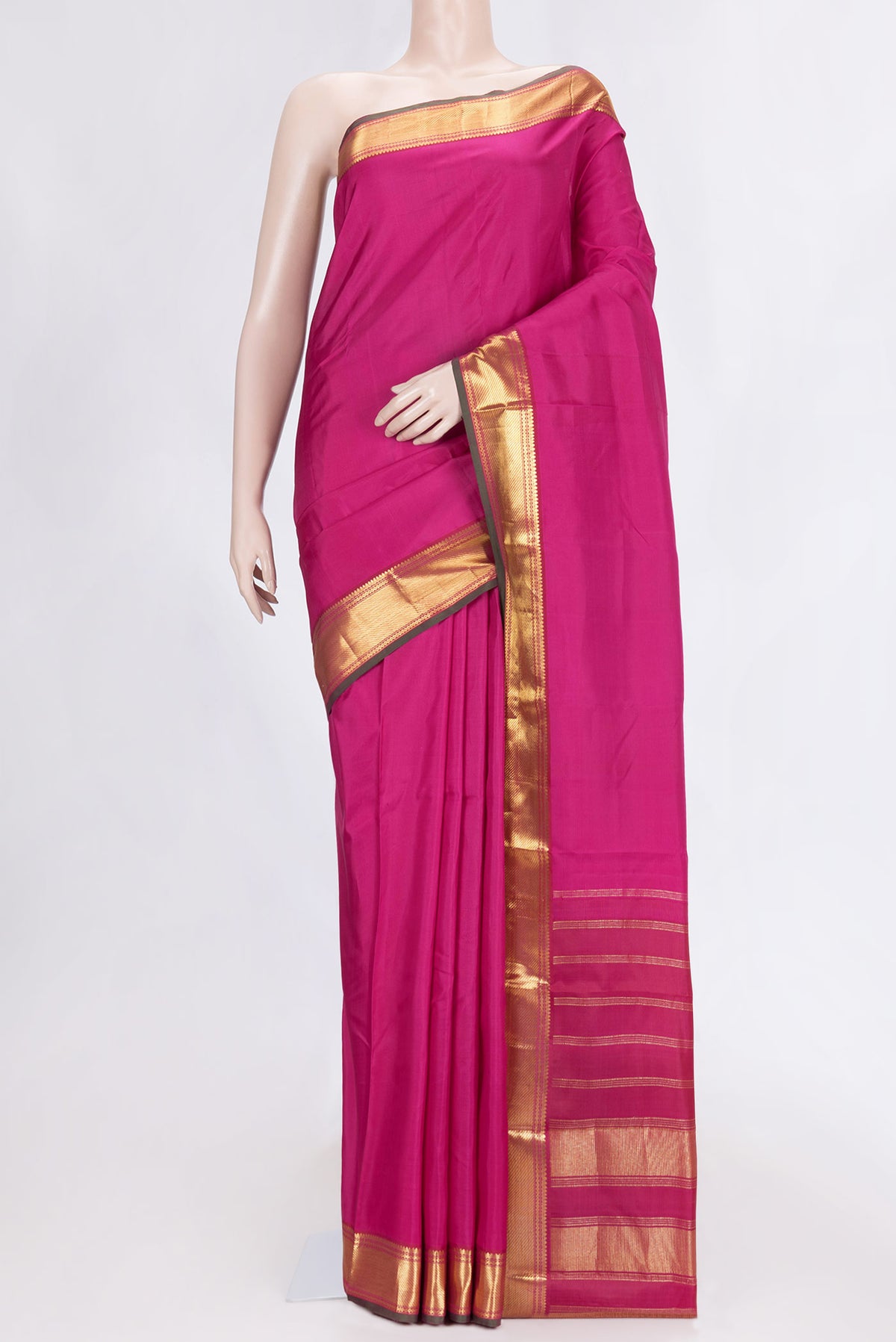 Pink Dual Tone Kanchipuram Silk Saree with Plain Body and Zari Border.  displayed on a mannequin