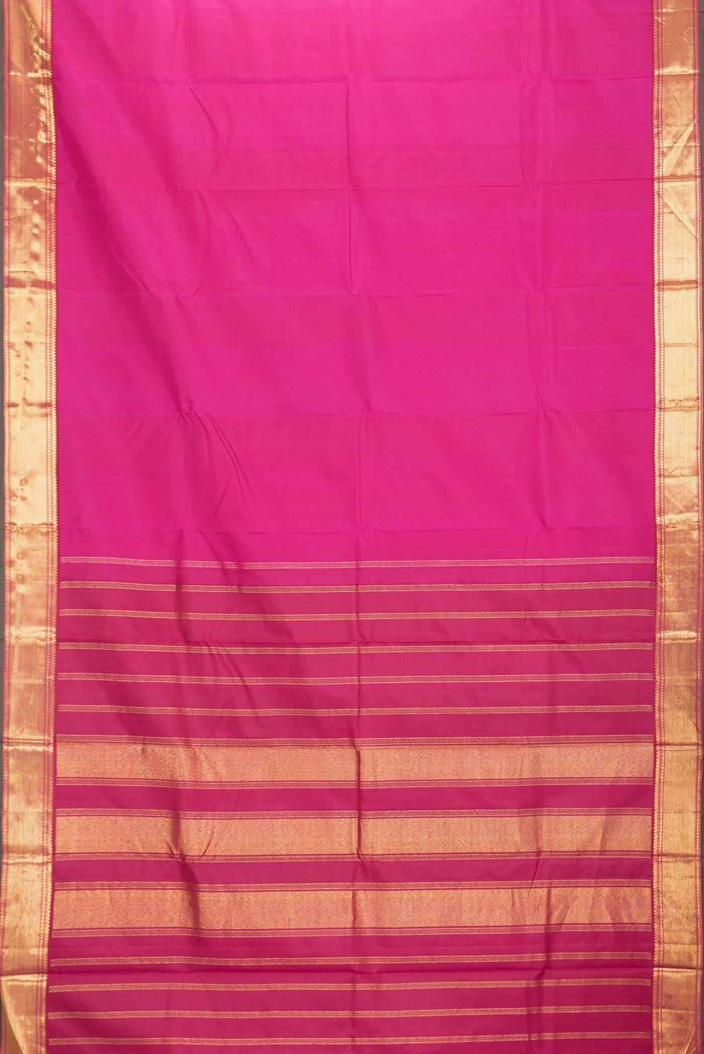 Flat view of Pink Dual Tone Kanchipuram Silk Saree with Plain Body and Zari Border. 