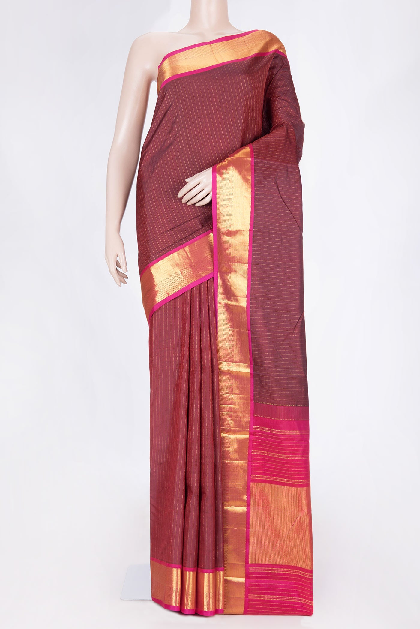 Maroon Dual Tone Kanchipuram Silk Saree with Stripes on the body and Zari Border displayed on a mannequin