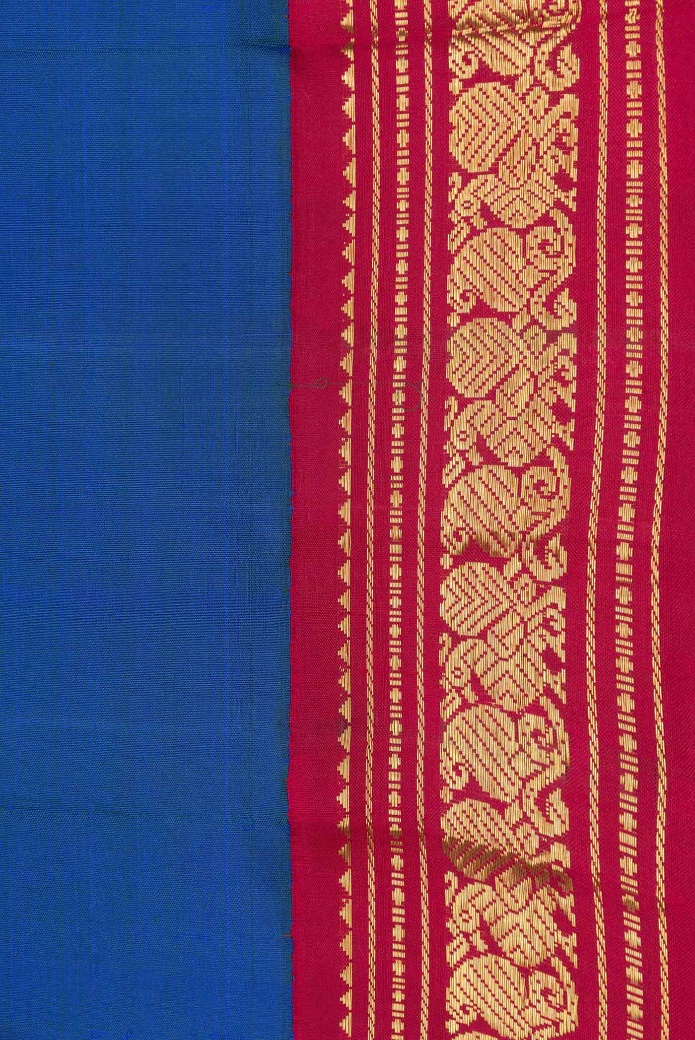 Border image of Peacock Blue Dual Tone Kanjivaram Saree with Plain Body and Zari Border. 