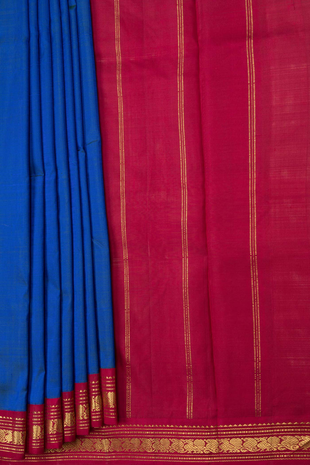 Pleats and pallu of Peacock Blue Dual Tone Kanjivaram Saree with Plain Body and Zari Border. 