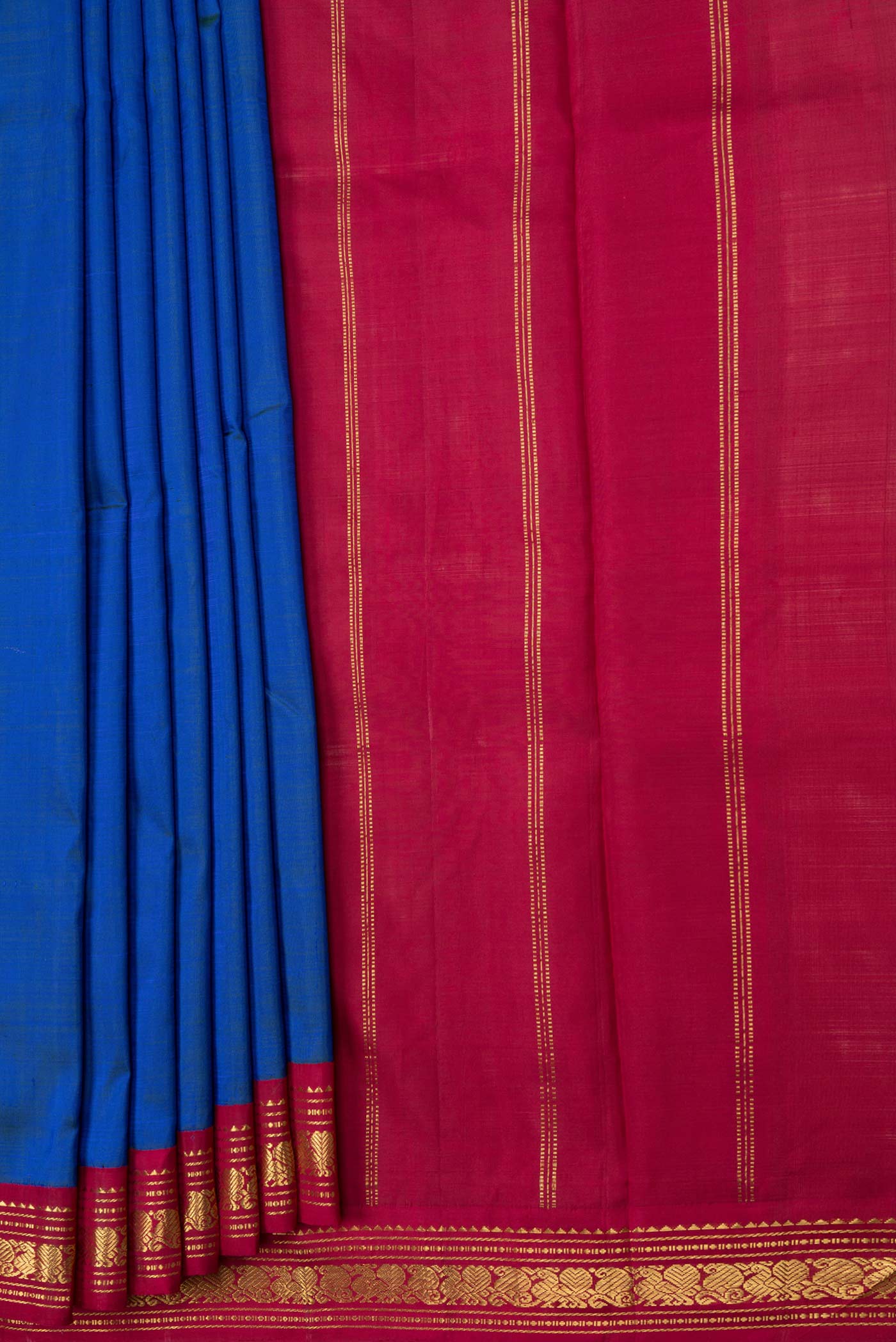 Pleats and pallu of Peacock Blue Dual Tone Kanjivaram Saree with Plain Body and Zari Border. 