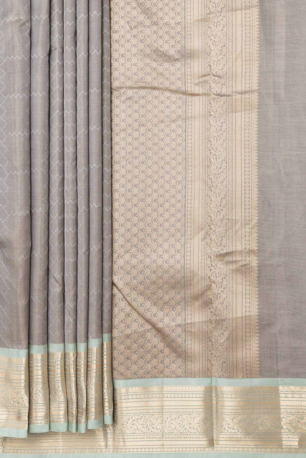 Pleats and pallu of Grey Kanchipuram Silk Saree with Jacquard design on the body and Zari Border