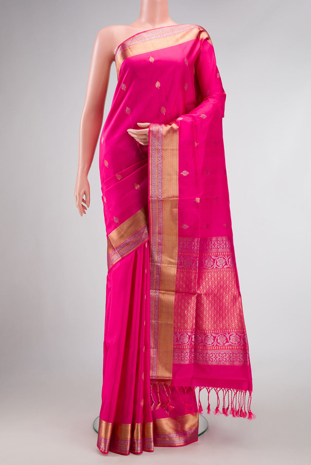 Pink Dual Tone Soft Silk Saree with Zari Butta on the body and Zari Border.  displayed on a mannequin