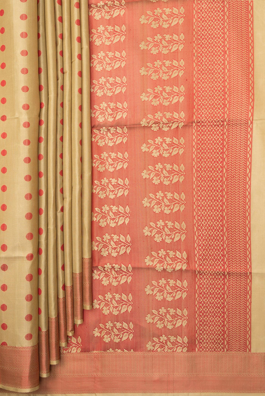 Pleats and pallu of Pure Silk Beige Dual Tone Soft Saree with Thread Butta on the body and Thread Border. 