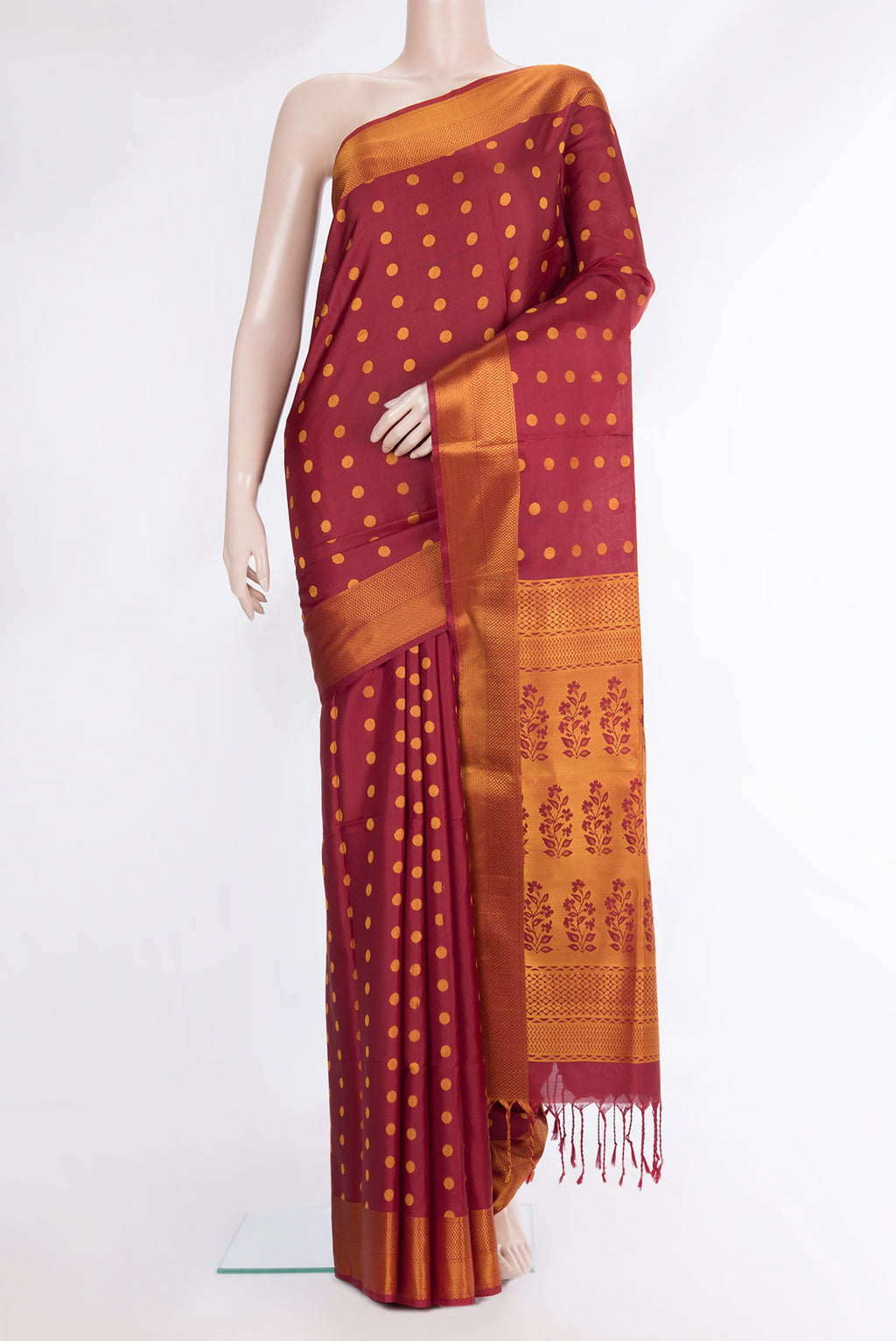 Pure Silk Maroon Dual Tone Soft Saree with Thread Butta on the body and Thread Border.  displayed on a mannequin