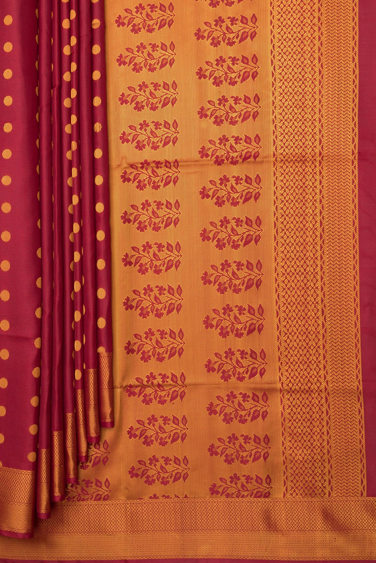 Pleats and pallu of Pure Silk Maroon Dual Tone Soft Saree with Thread Butta on the body and Thread Border. 
