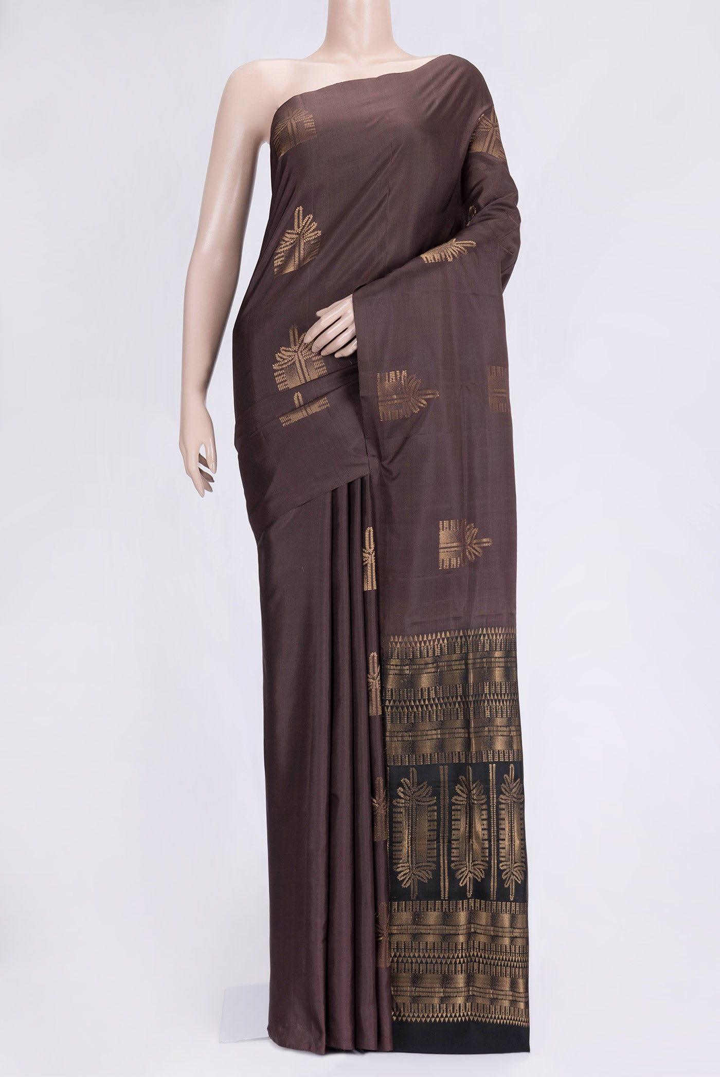 Brown Dual Tone Soft Silk Saree with Zari Butta on the body and Without Border.  displayed on a mannequin
