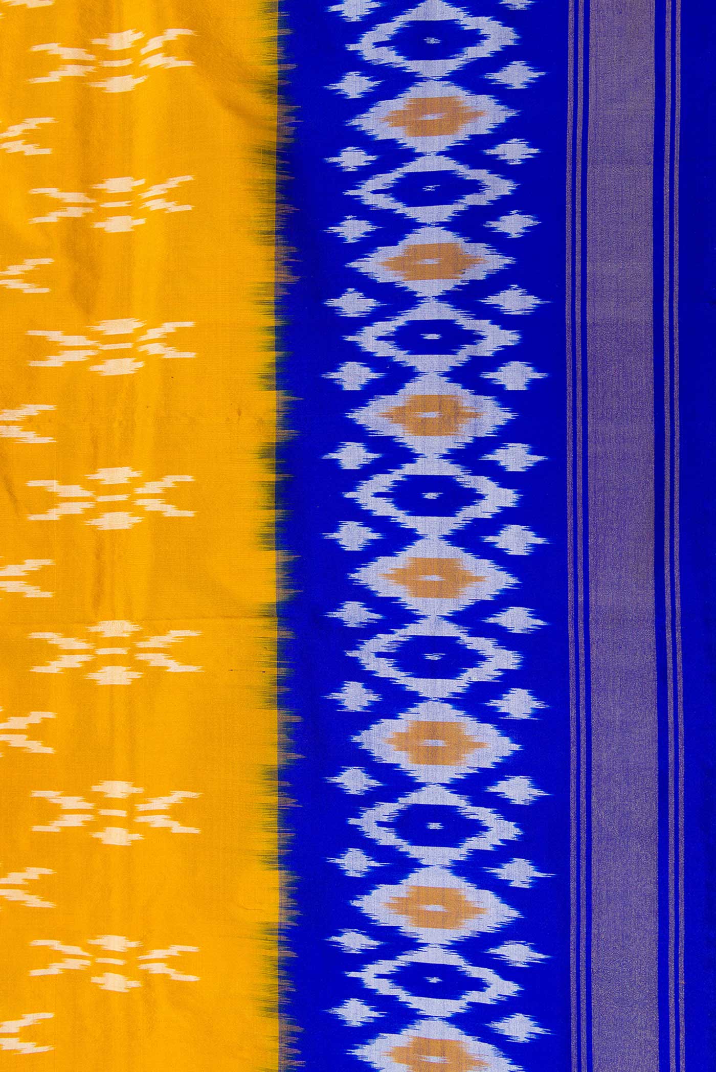 Border image of Mustard Dual Tone Double Ikat Saree with Ikat Print on the body and Ikat Border. 