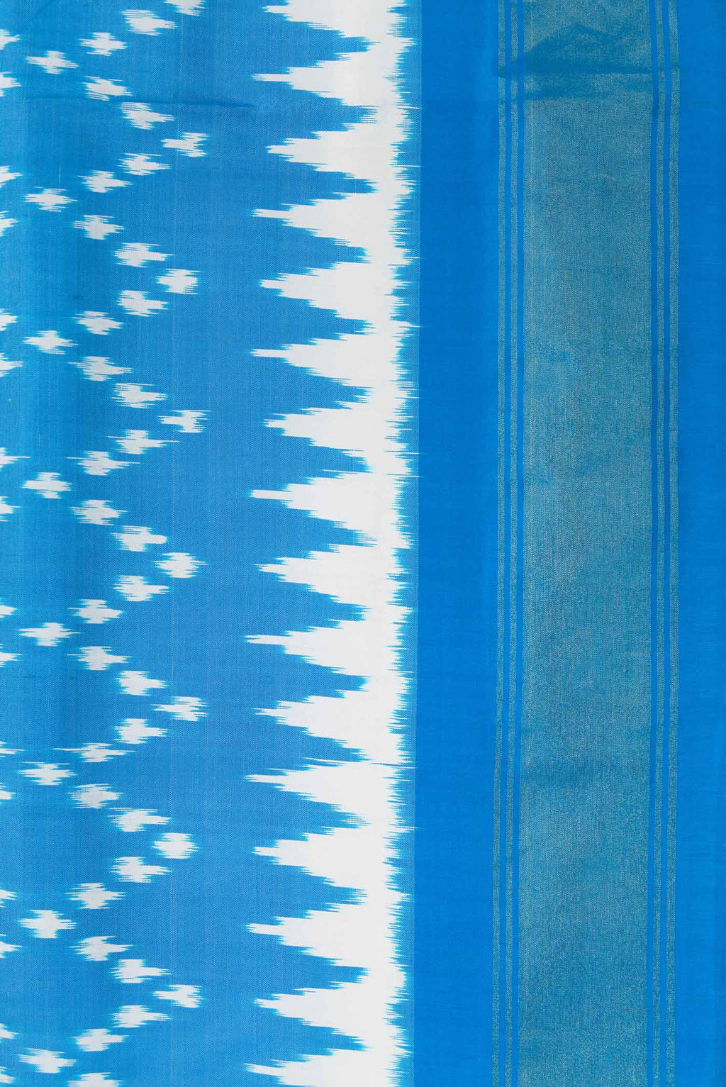Border image of Peacock Blue Dual Tone Double Ikat Saree with Ikat Print on the body and Ikat Border. 