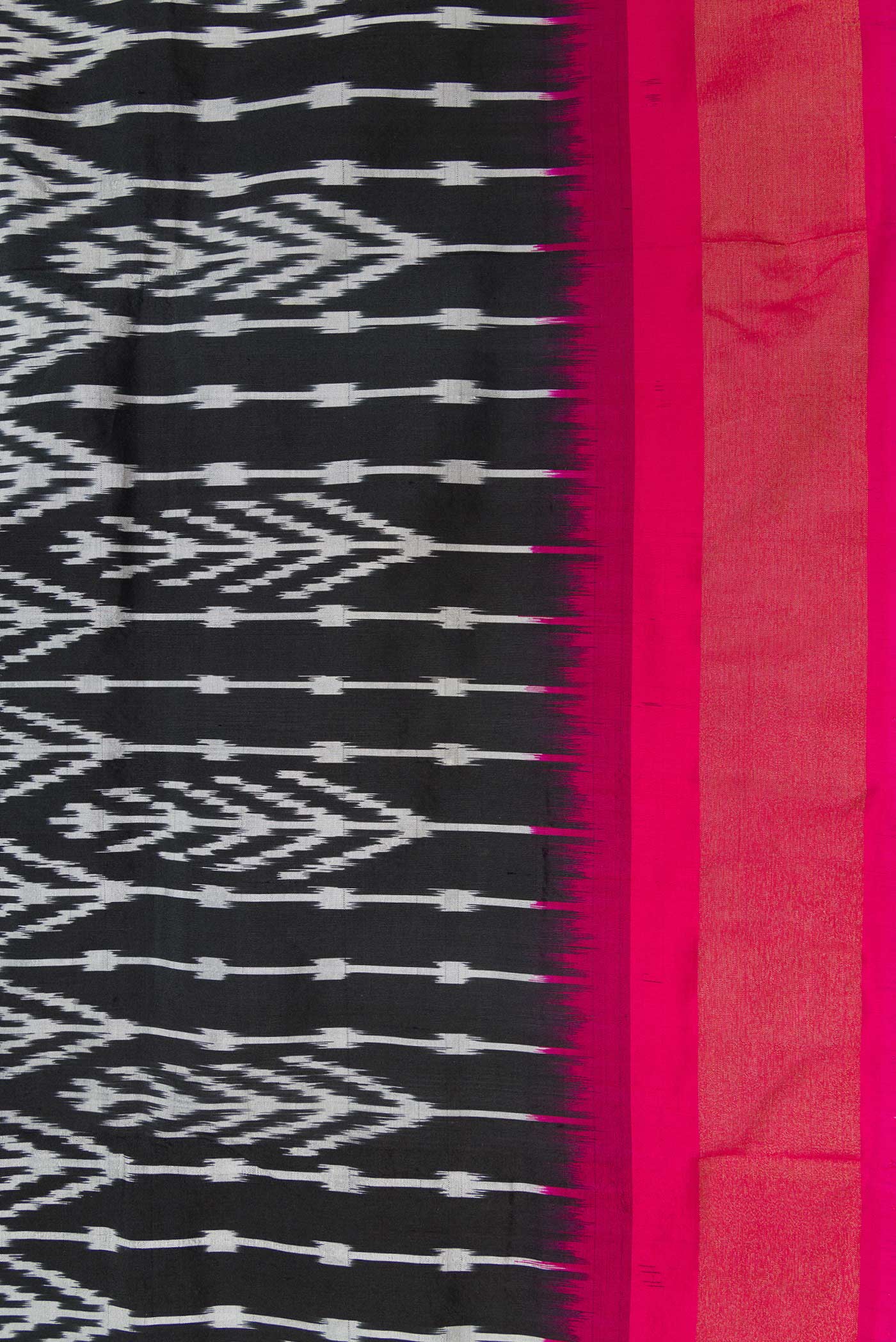 Border image of Black Dual Tone Double Ikat Saree with Ikat Print on the body and Ikat Border. 