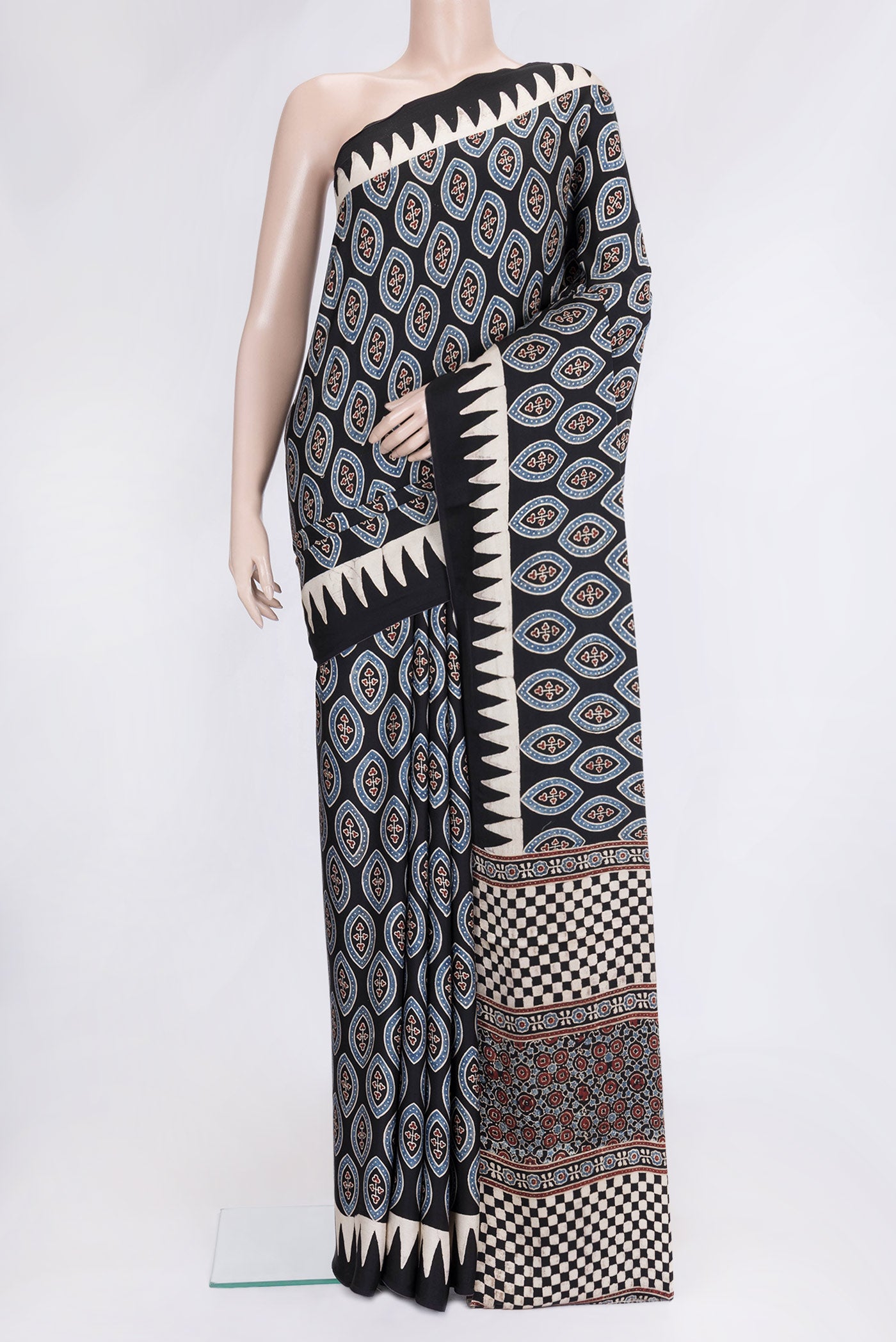 Black Dual Tone Blended Satin Crepe Saree with Printed design on the body and Printed Border.  displayed on a mannequin