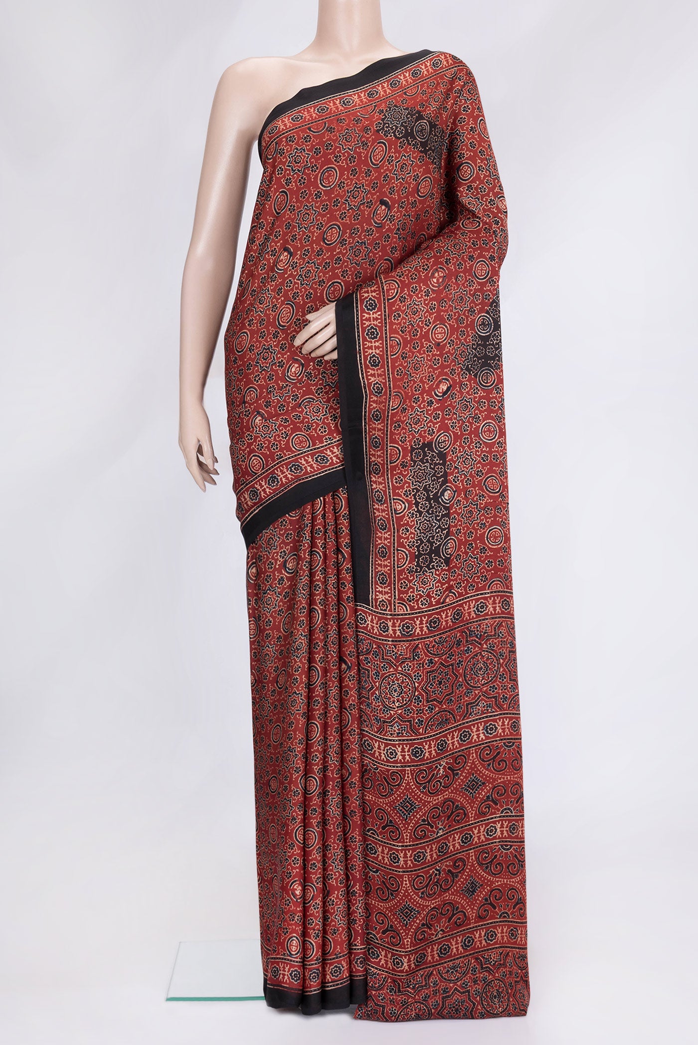 Maroon Dual Tone Blended Satin Crepe Saree with Printed design on the body and Printed Border.  displayed on a mannequin