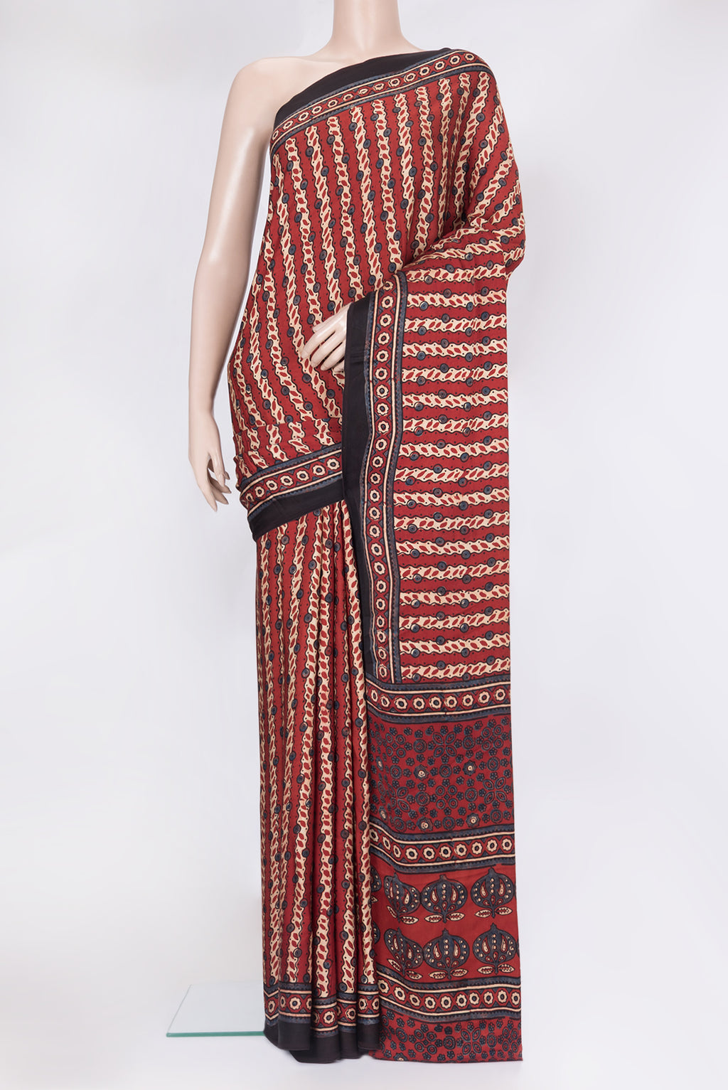 Maroon Blended Satin Crepe Saree with Ajrakh Print on the body and Printed Border.  displayed on a mannequin