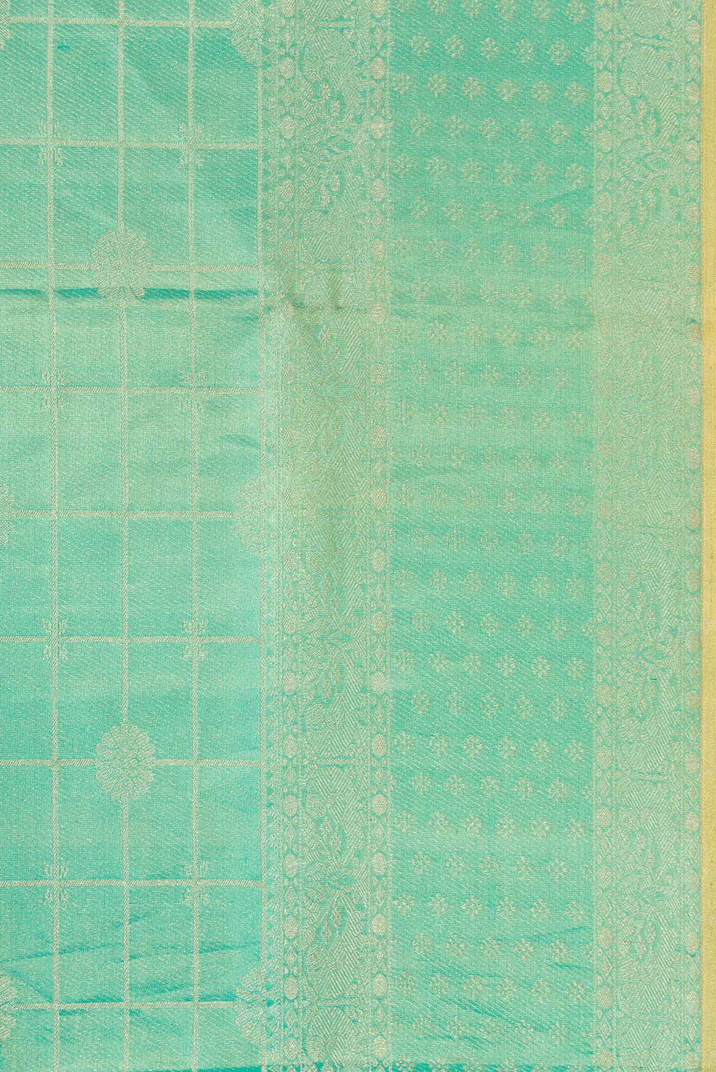 Border image of Sea Green Dual Tone Kanjivaram Tissue Silk Saree with Zari Brocade on the body and Zari Border. 