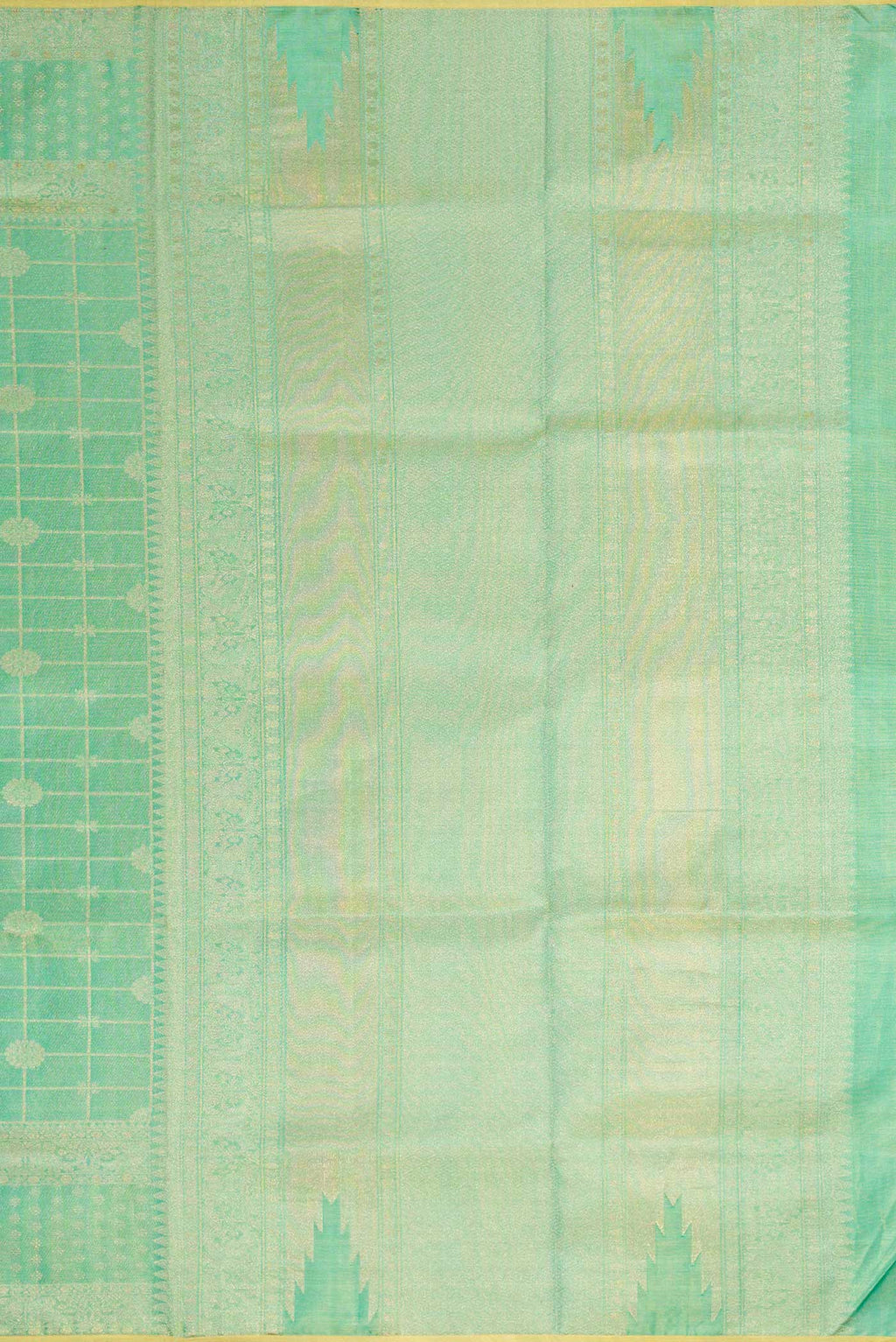 Close up image of the pallu of Sea Green Dual Tone Kanjivaram Tissue Silk Saree with Zari Brocade on the body and Zari Border. 