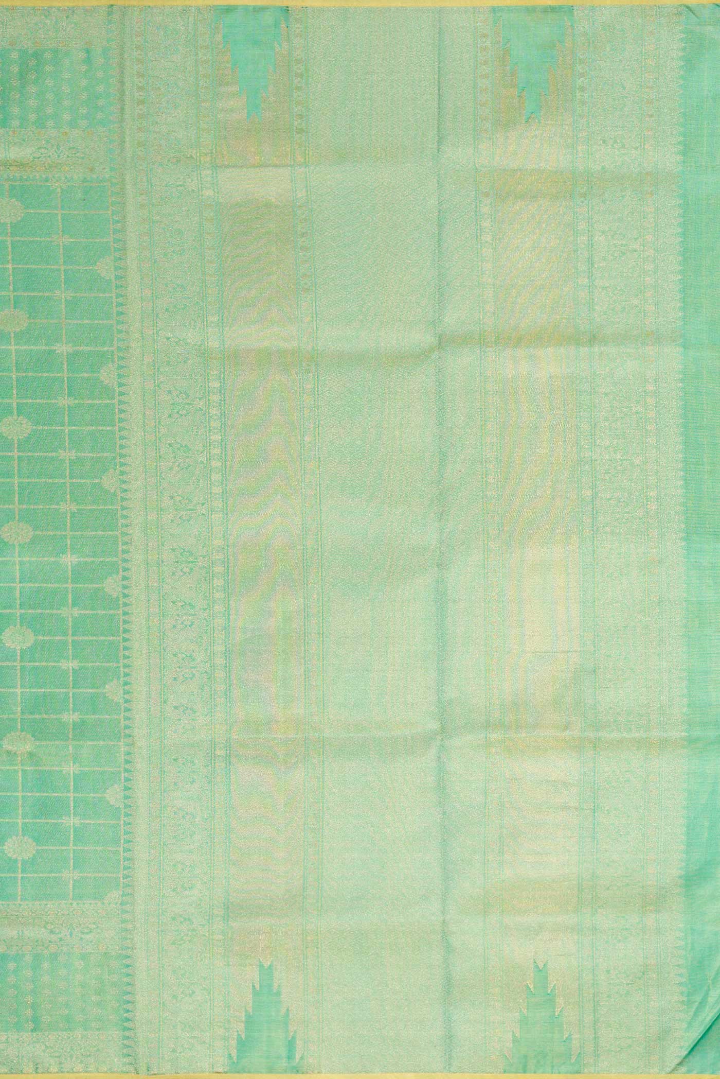 Close up image of the pallu of Sea Green Dual Tone Kanjivaram Tissue Silk Saree with Zari Brocade on the body and Zari Border. 