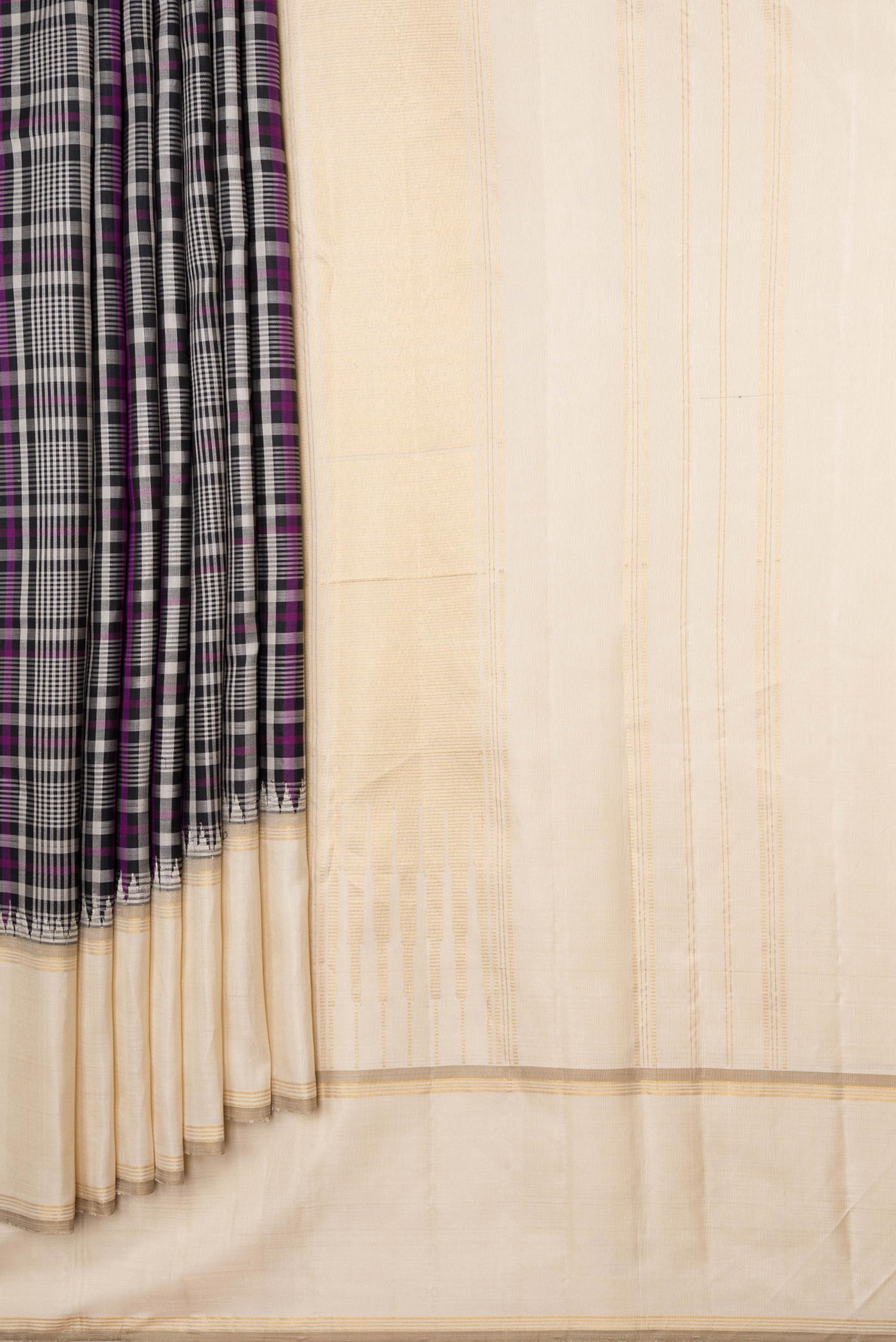 Pleats and pallu of Black and Magenta Color Kanchipuram Silk Saree with Checked design on the body and Zari Border