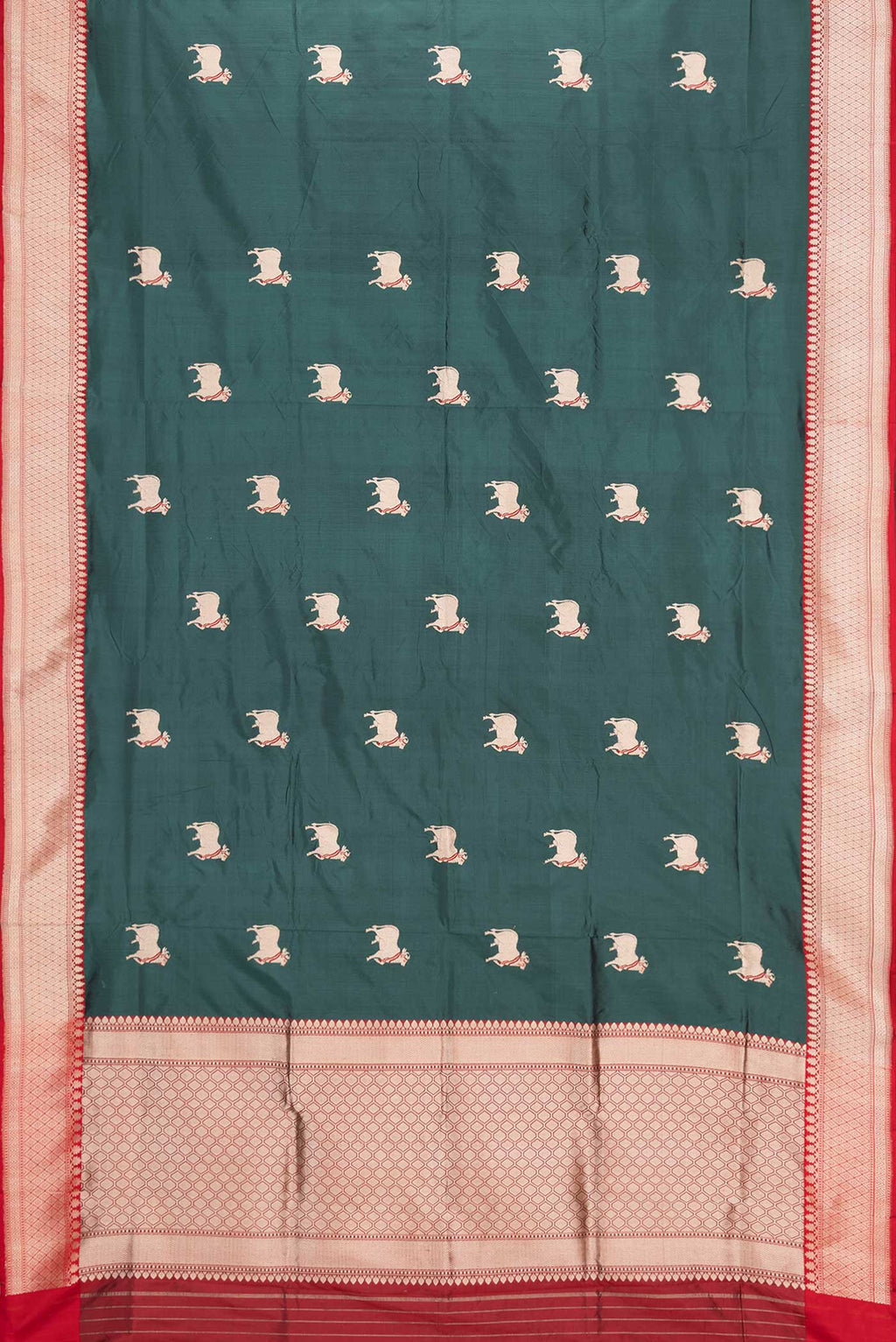 Flat view of Blue Banarasi Katan Silk Saree with Zari Butta on the body and Zari Border