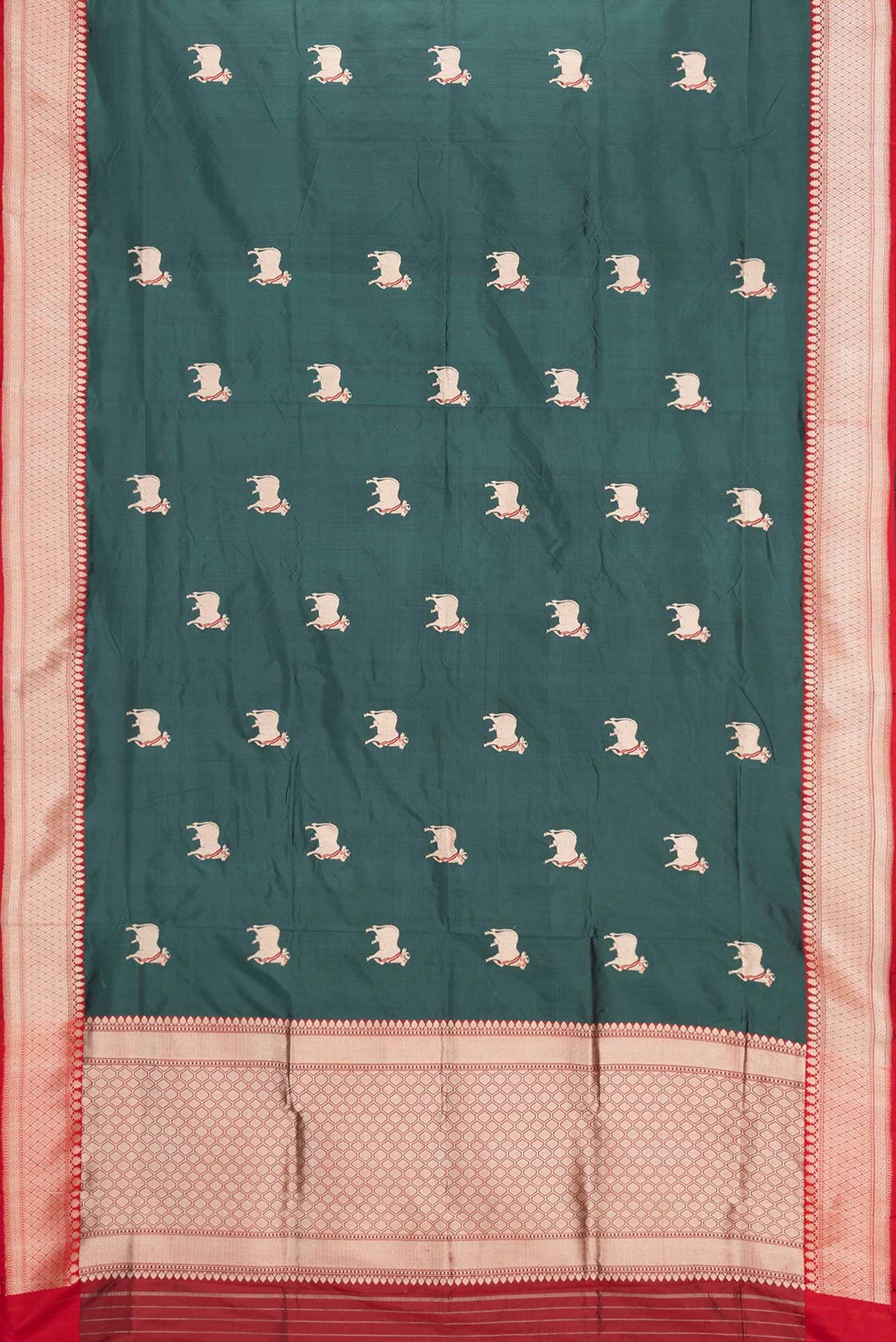 Flat view of Blue Banarasi Katan Silk Saree with Zari Butta on the body and Zari Border