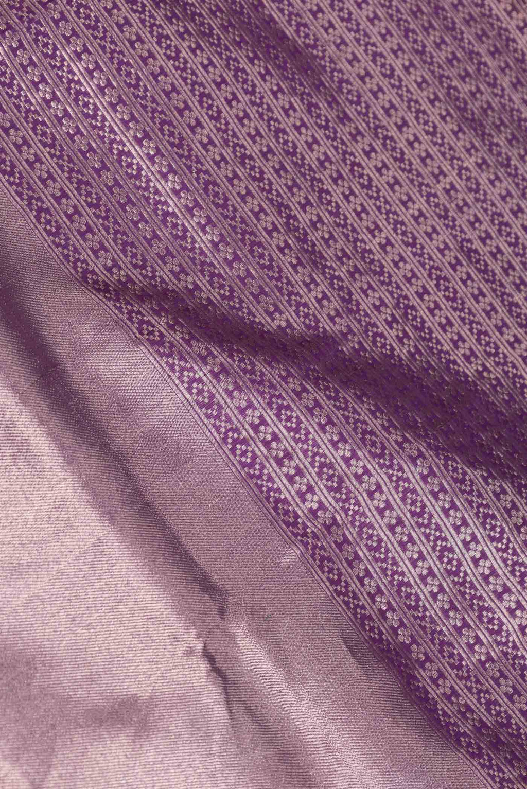 Close up of Purple Dual Tone Banarasi Saree with Zari Brocade on the body and Zari Border displaying folds