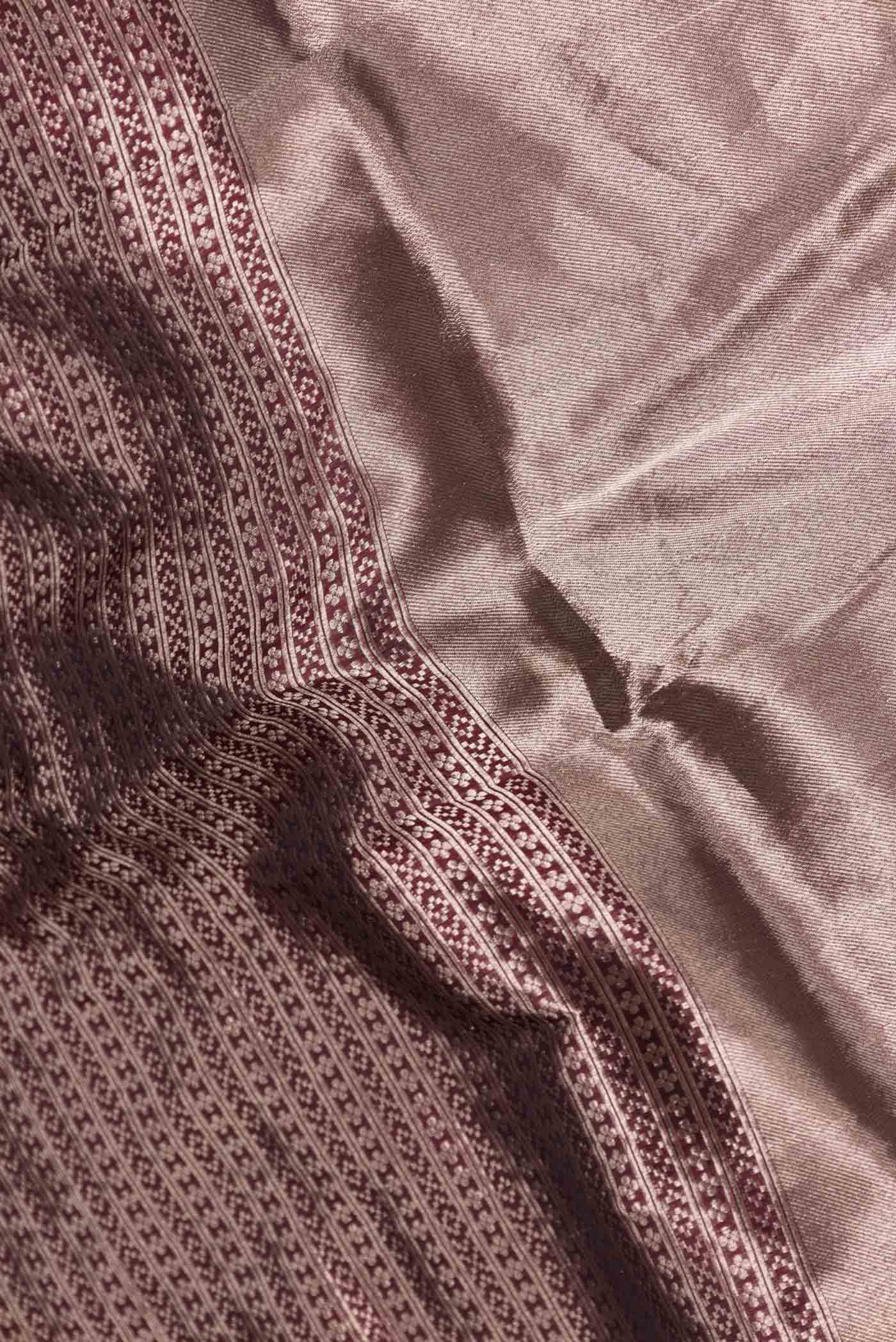 Close up of Coffee Brown Dual Tone Banarasi Saree with Zari Brocade on the body and Zari Border displaying folds