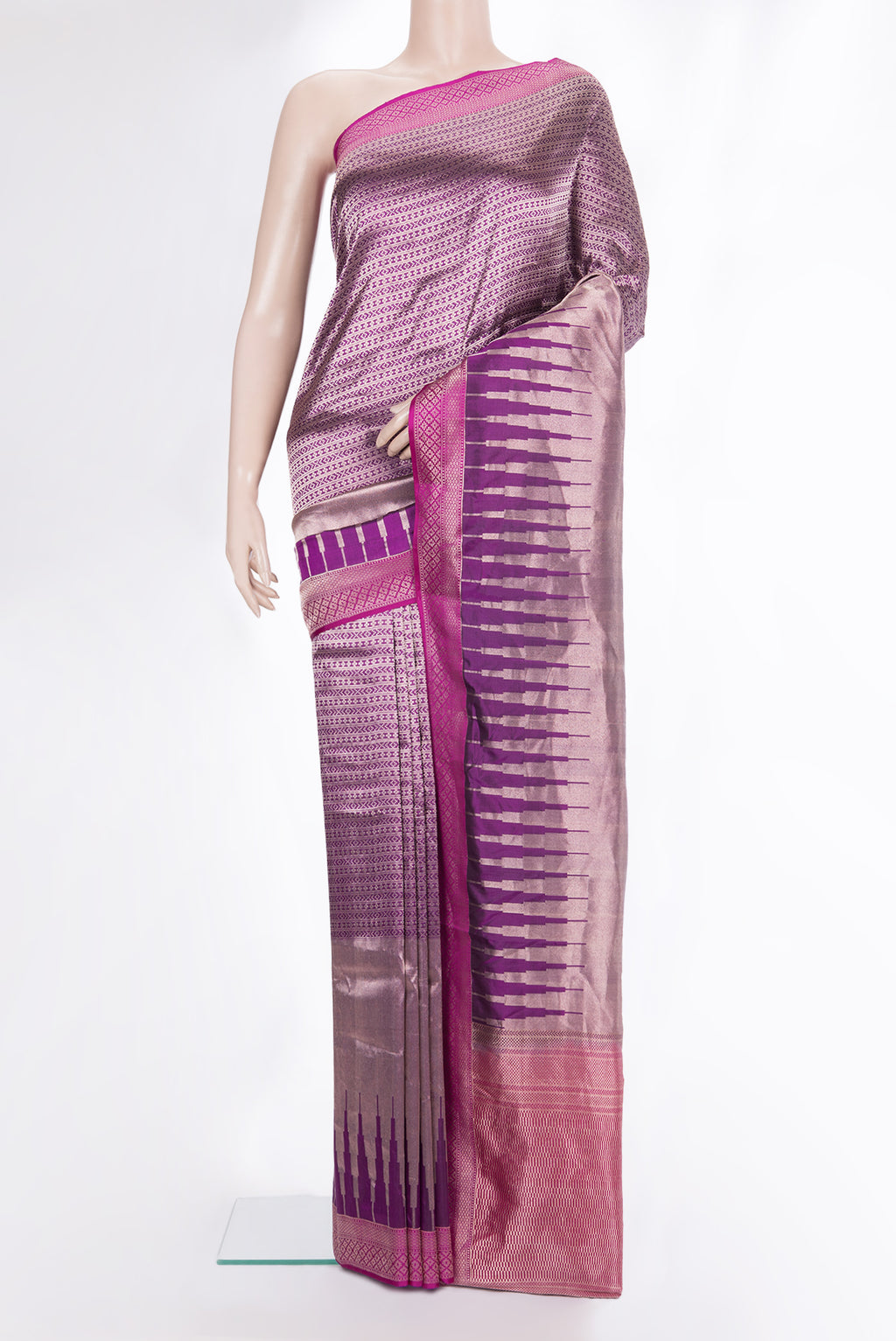 Pure Silk Magenta Banarasi Saree with Zari Brocade on the body and Zari Border.  displayed on a mannequin