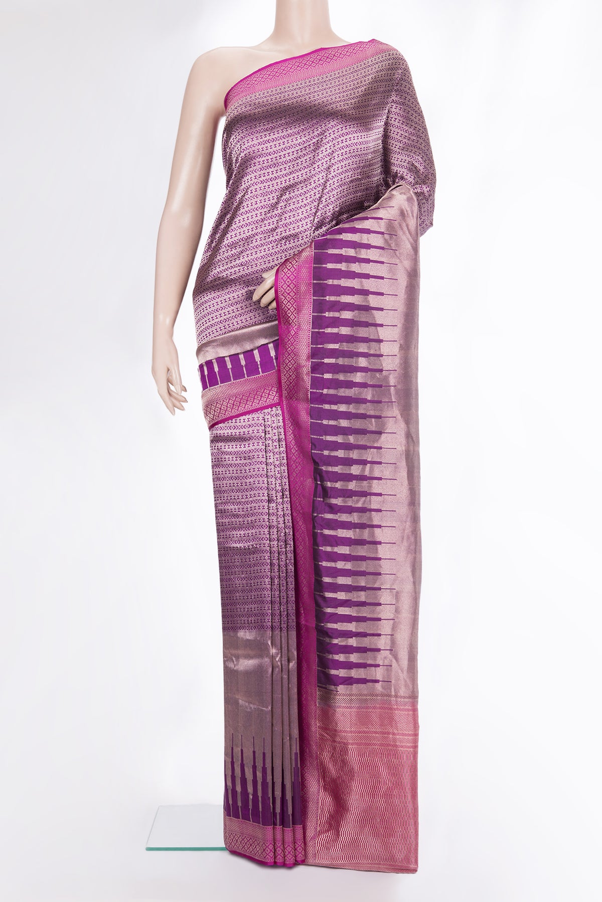 Pure Silk Magenta Banarasi Saree with Zari Brocade on the body and Zari Border.  displayed on a mannequin