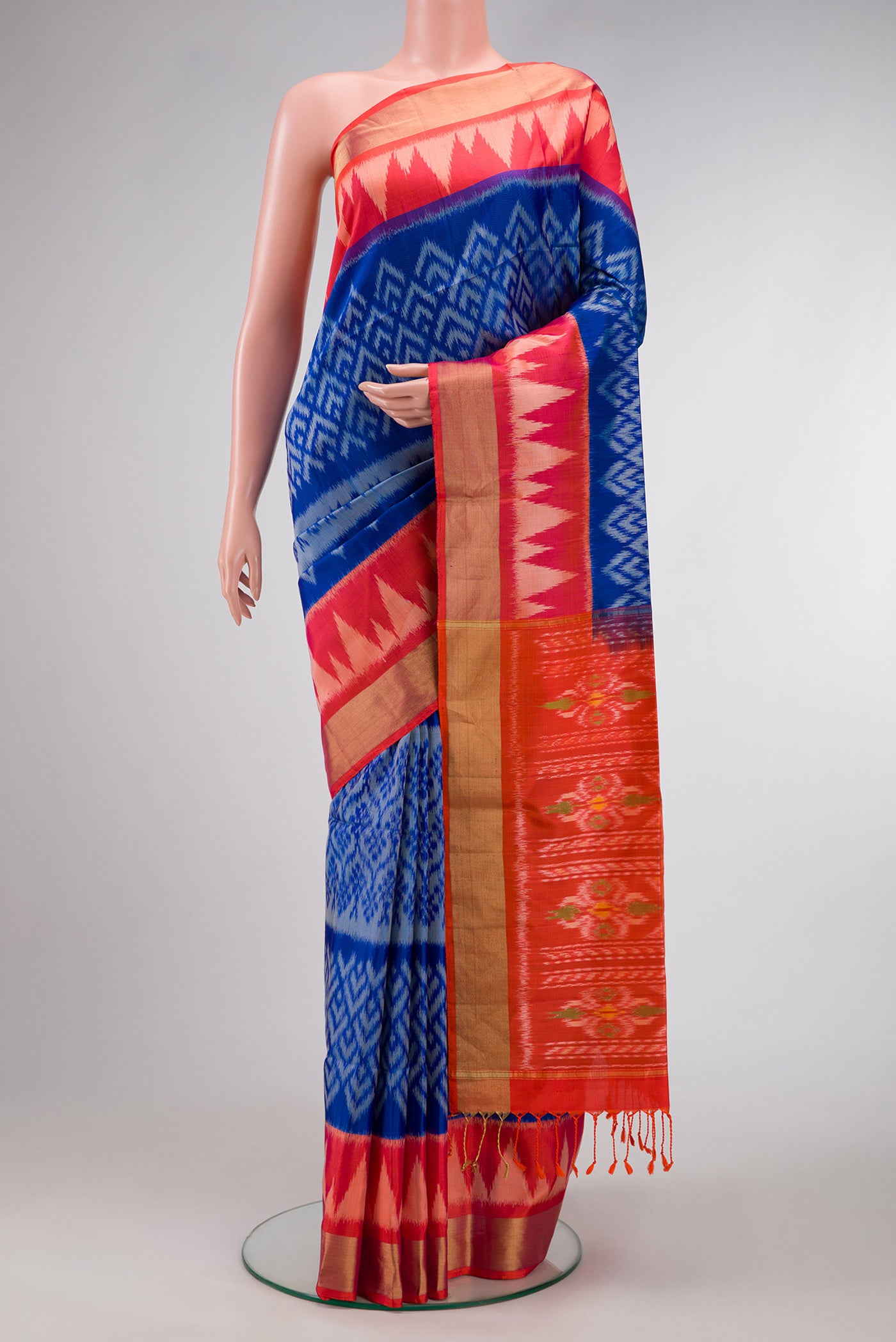 Royal Blue Dual Tone Soft Silk Saree with Ikat Print on the body and Ikat Border.  displayed on a mannequin