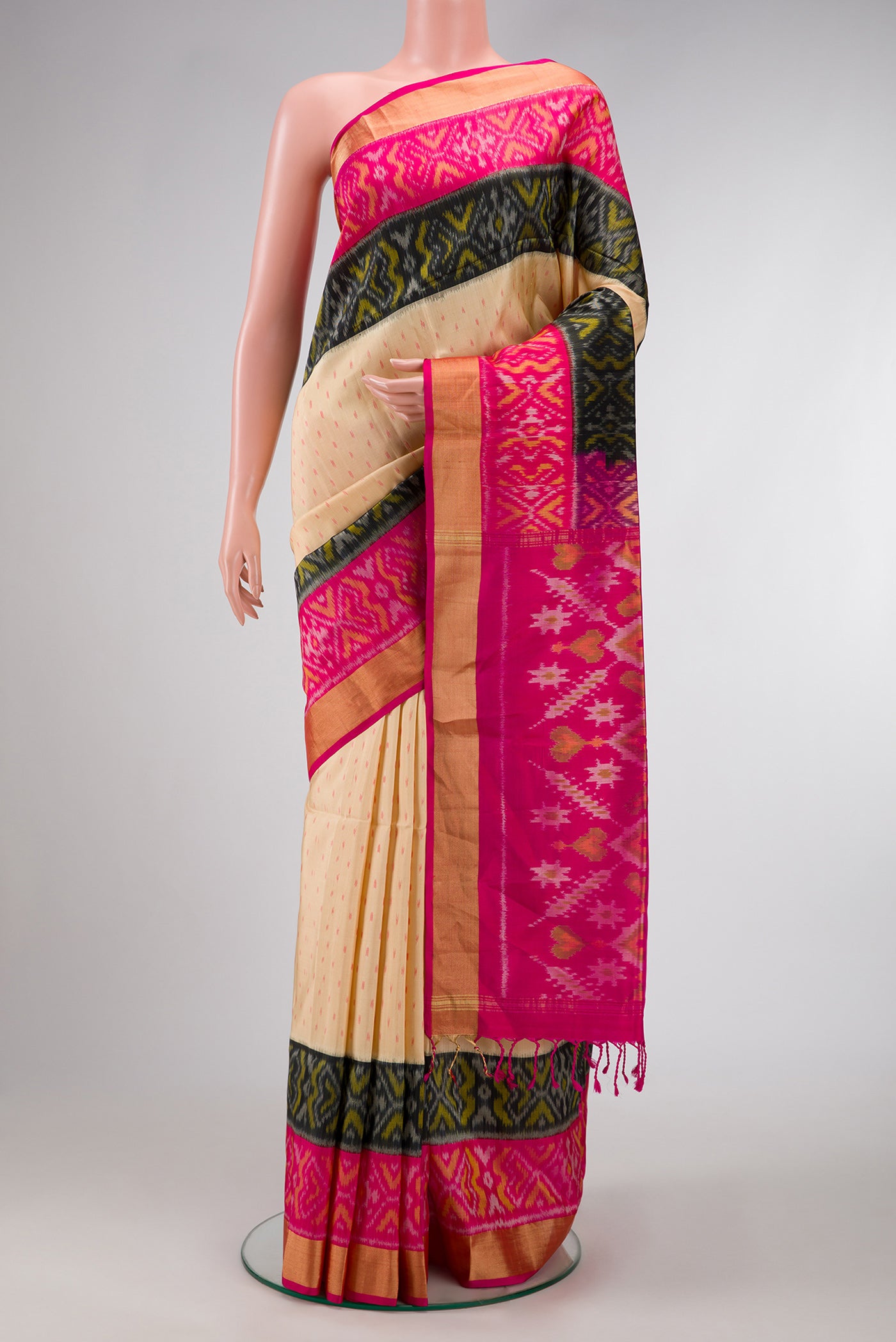 Sandal Dual Tone Soft Silk Saree with Ikat Print on the body and Ikat Border.  displayed on a mannequin