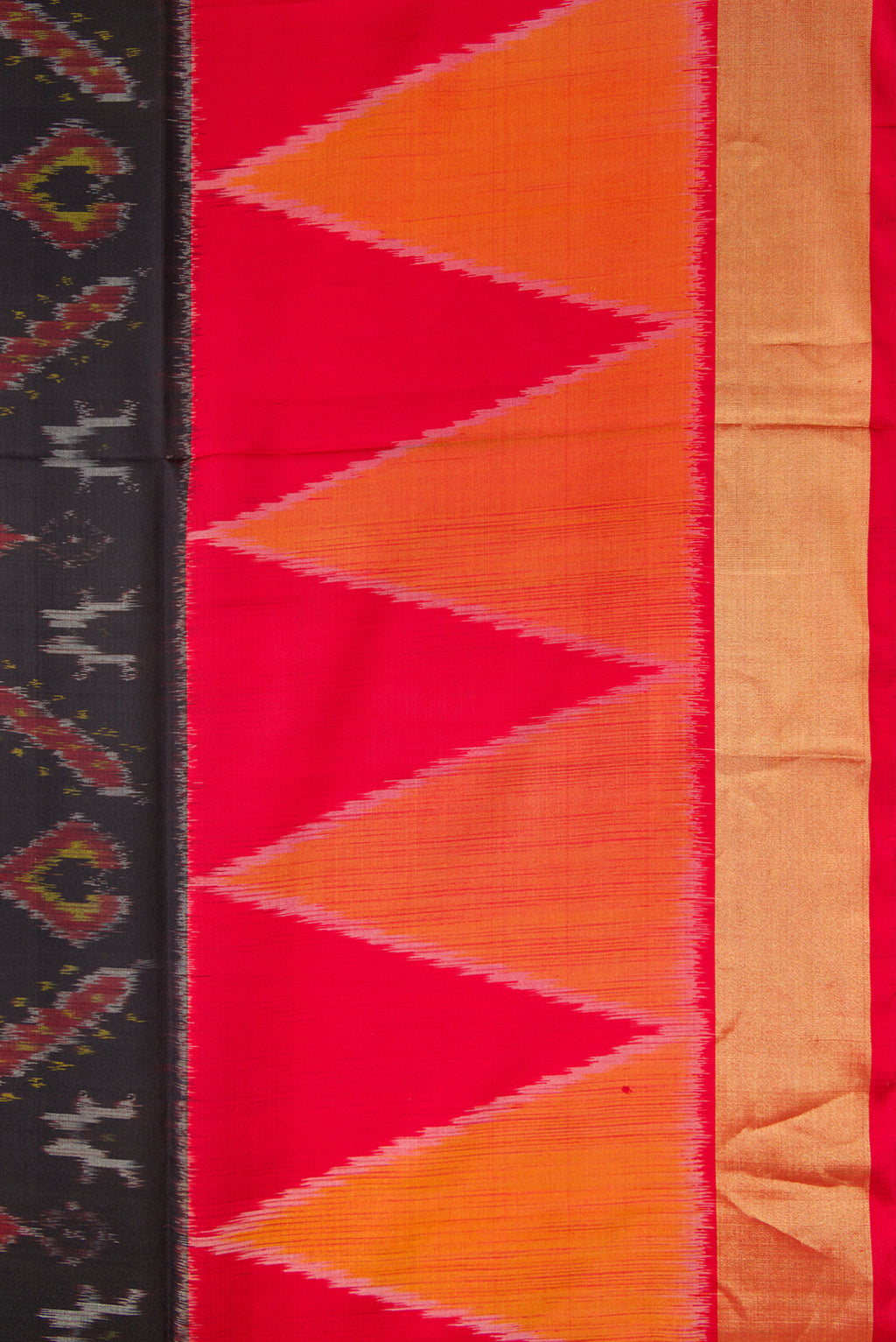 Border image of Black Dual Tone Soft Silk Saree with Ikat Print on the body and Ikat Border. 