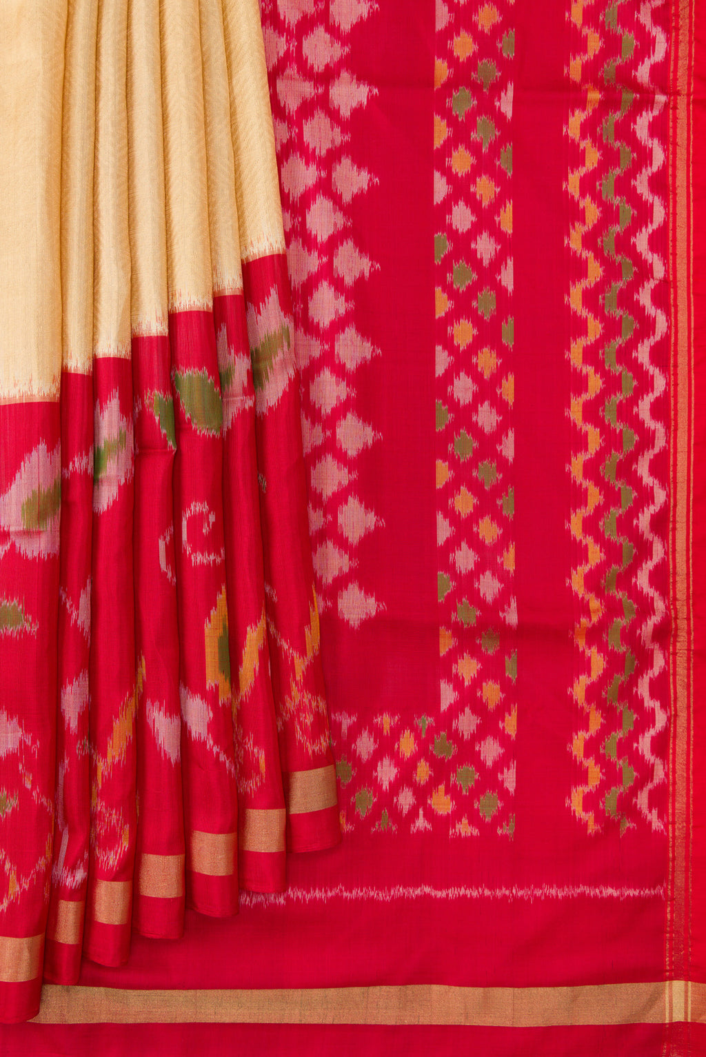 Pleats and pallu of Gold Dual Tone Soft Silk Saree with Zari Brocade on the body and Ikat Border. 