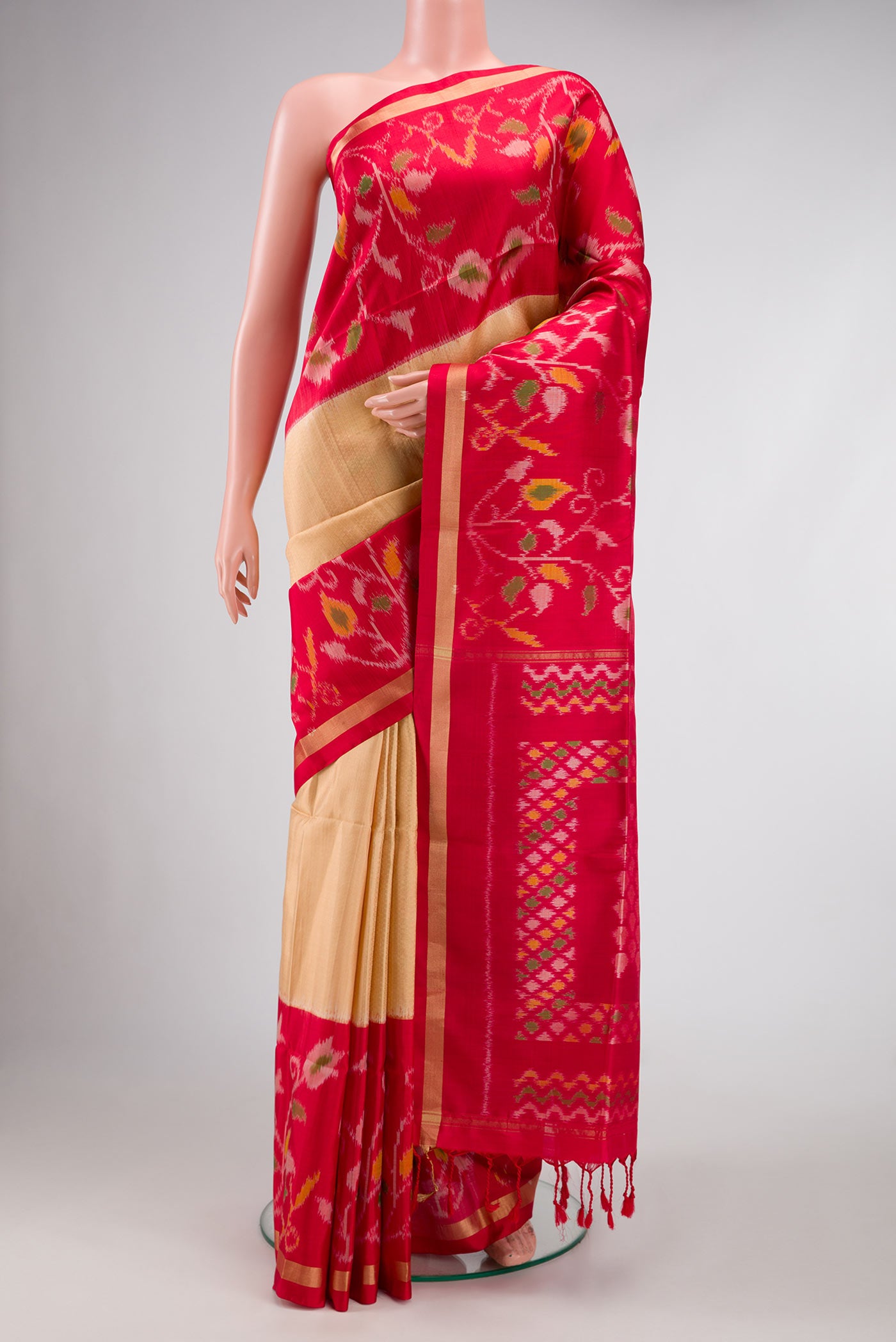 Sandal Dual Tone Soft Silk Saree with Zari Brocade on the body and Ikat Border.  displayed on a mannequin