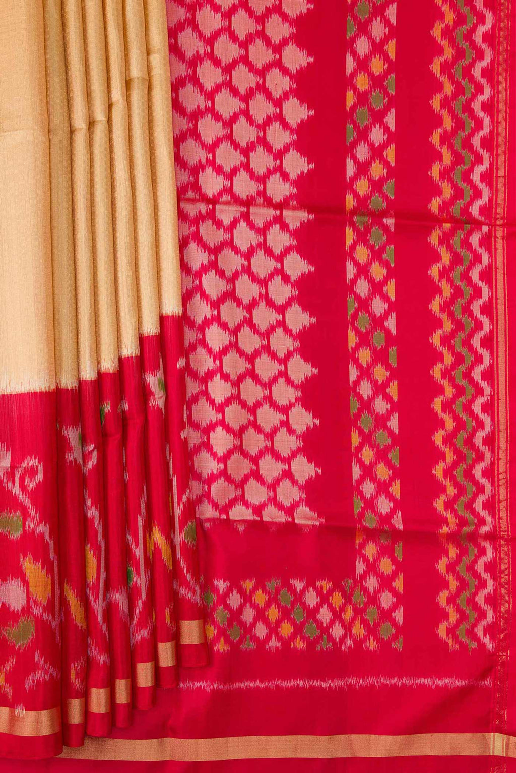 Pleats and pallu of Sandal Dual Tone Soft Silk Saree with Zari Brocade on the body and Ikat Border. 