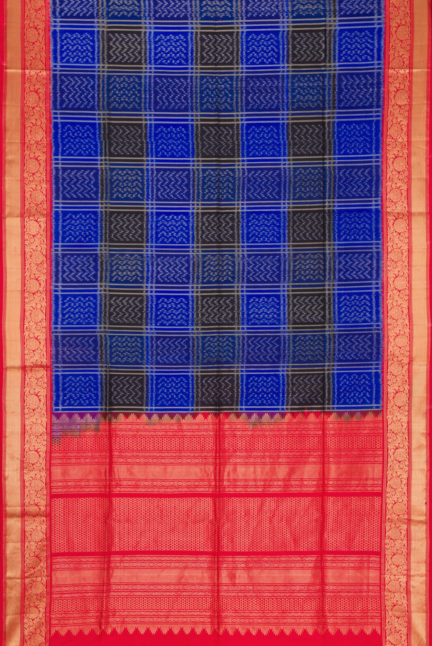 Flat view of Royal Blue Dual Tone Soft Silk Saree with Ikat Print on the body and Zari Border. 