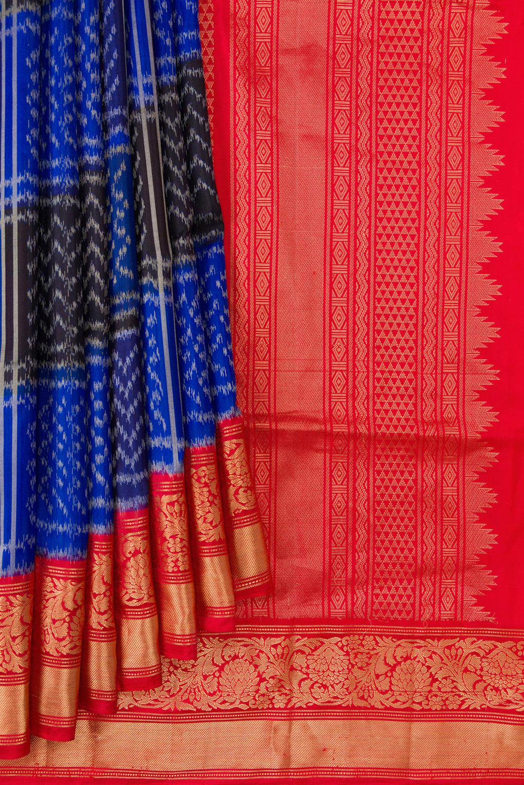 Pleats and pallu of Royal Blue Dual Tone Soft Silk Saree with Ikat Print on the body and Zari Border. 