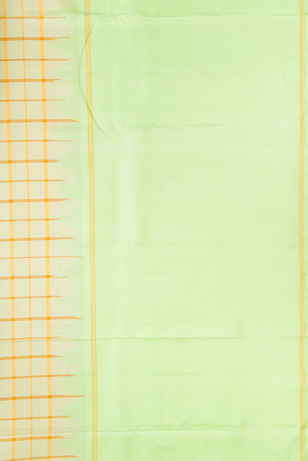 Border image of Pista Green Dual Tone Double Ikat Saree with Checked design on the body and Ganga Jamuna Border. 
