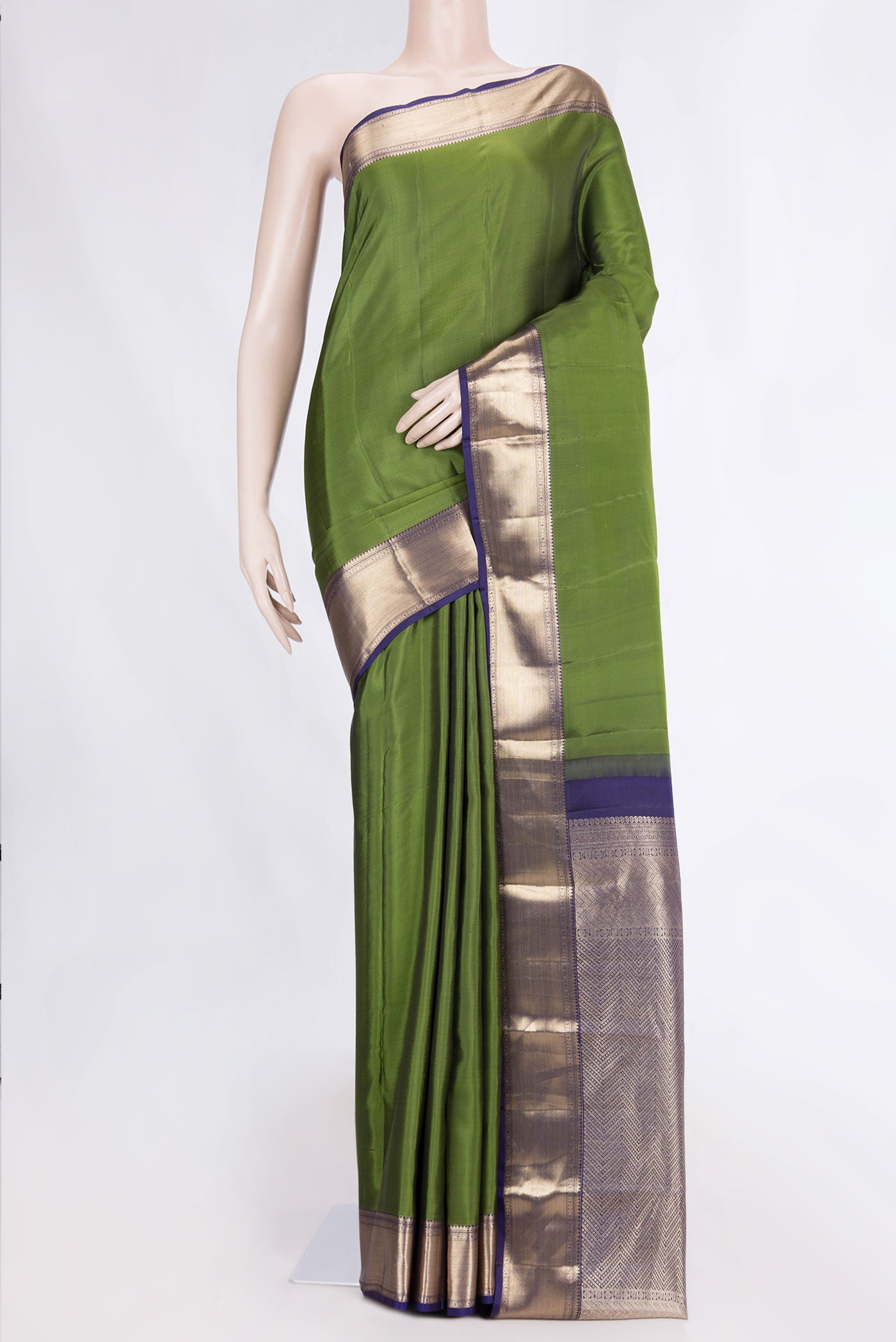 Mehandi Green Dual Tone Kanchipuram Silk Saree with Plain Body and Zari Border displayed on a mannequin