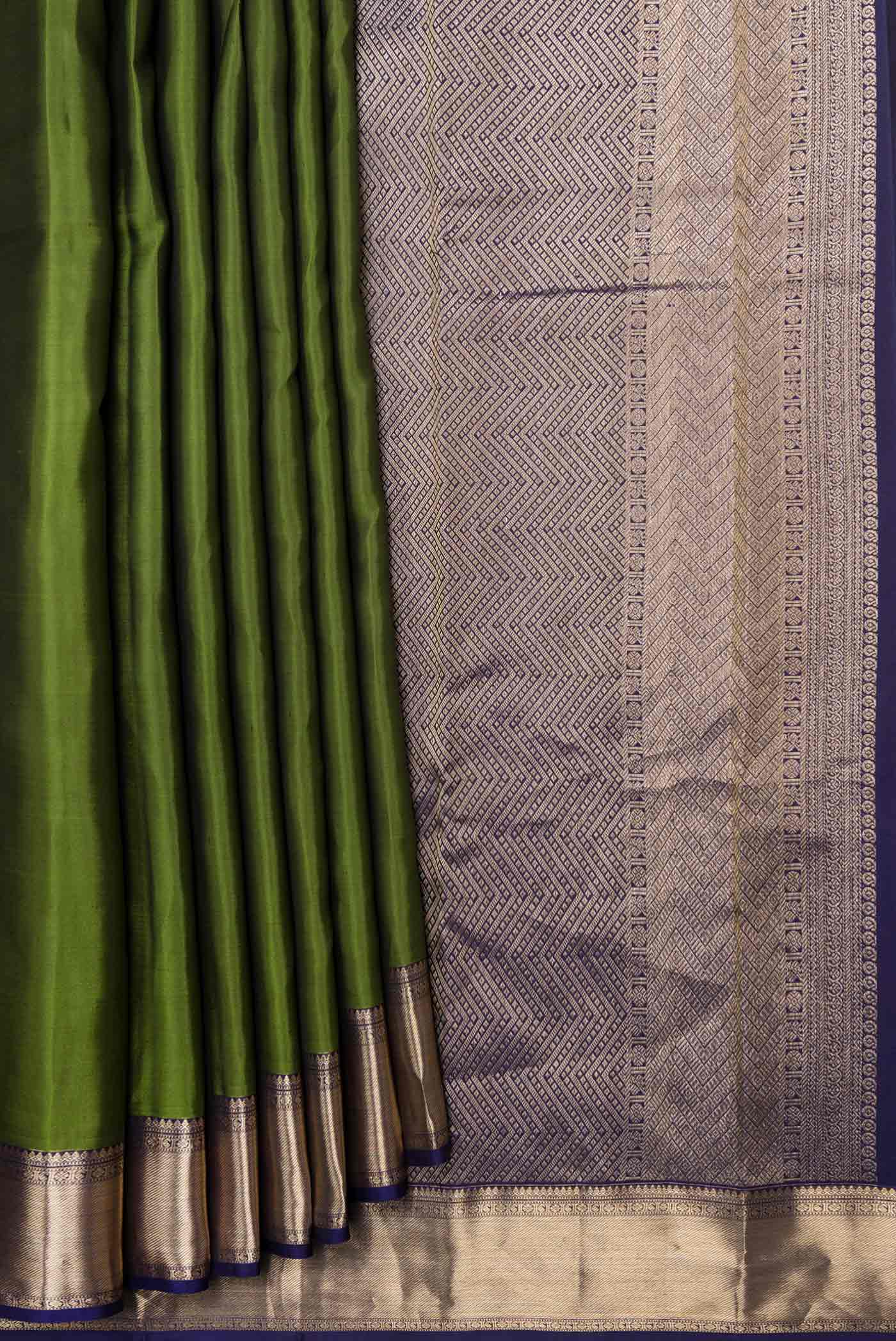 Pleats and pallu of Mehandi Green Dual Tone Kanchipuram Silk Saree with Plain Body and Zari Border