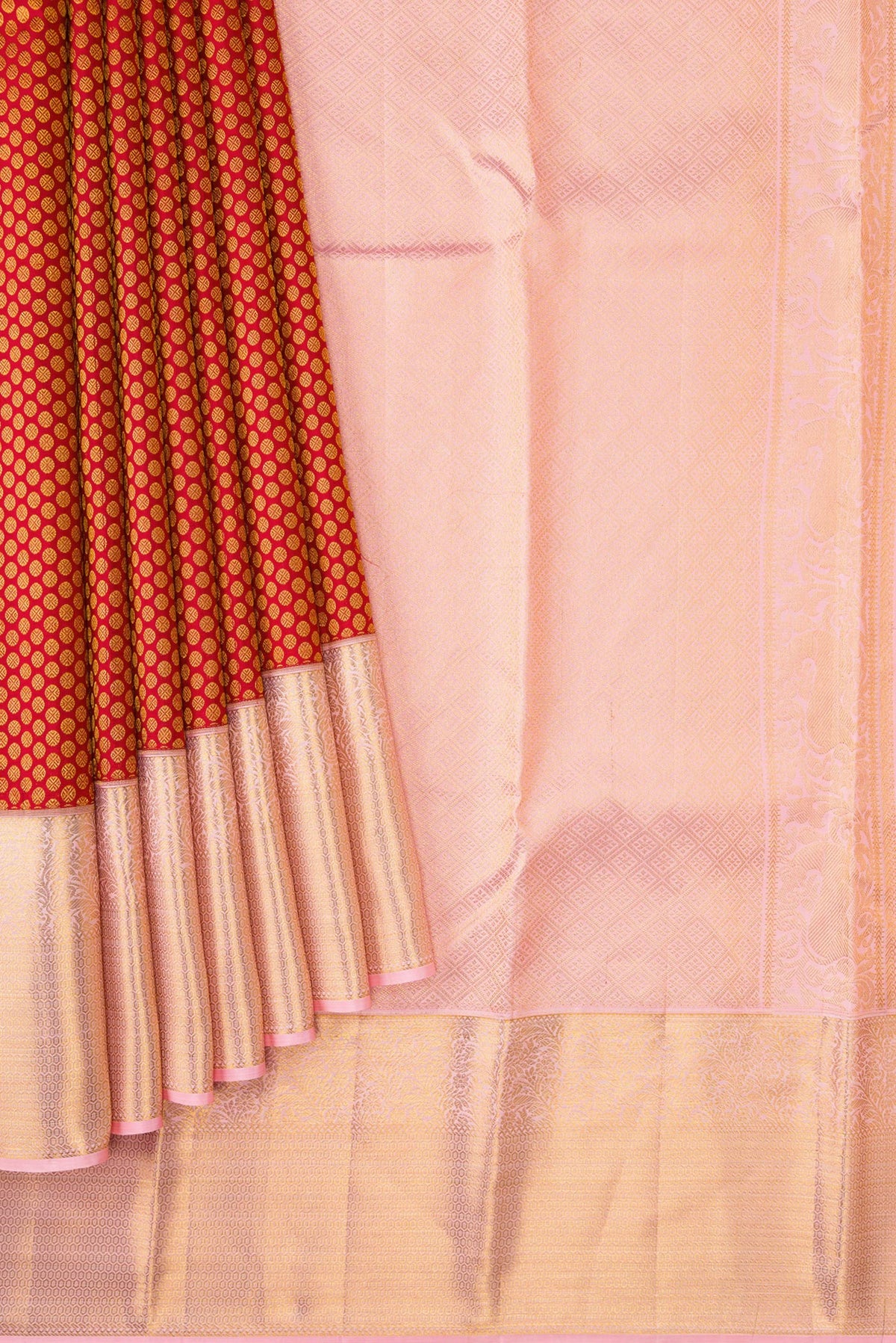 Pleats and pallu of Maroon Dual Tone Kanchipuram Silk Saree with Zari Brocade on the body and Zari Border. 