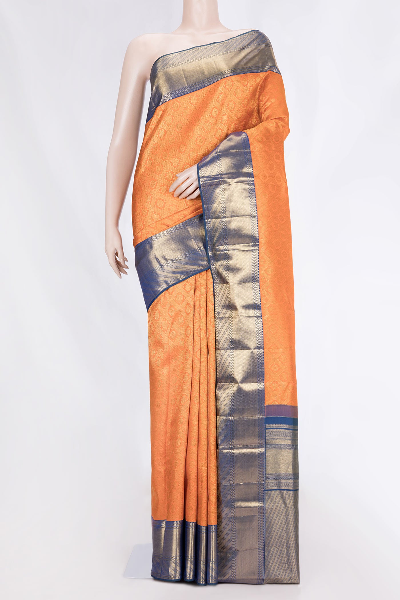 Orange Dual Tone Kanchipuram Silk Saree with Zari Brocade on the body and Zari Border displayed on a mannequin