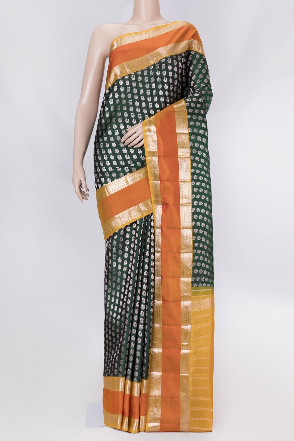 Green Dual Tone Kanchipuram Saree with Zari Brocade on the body and Zari Border displayed on a mannequin