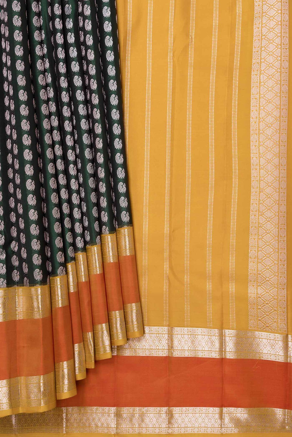 Pleats and pallu of Green Dual Tone Kanchipuram Saree with Zari Brocade on the body and Zari Border