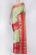 Pista Green Dual Tone Kanchipuram Saree with Zari Brocade on the body and Zari Border displayed on a mannequin
