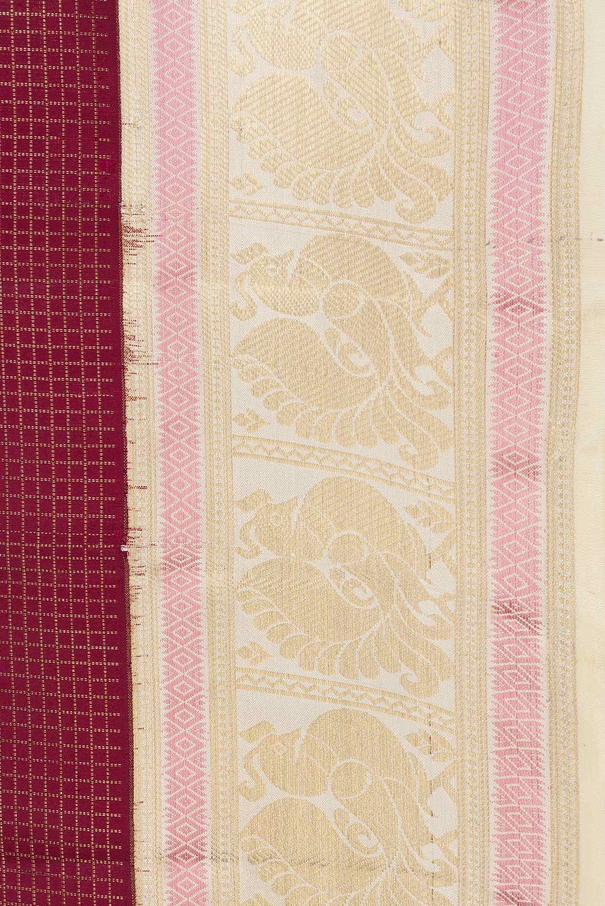 Border image of Maroon Dual Tone Kanchipuram Saree with Checked design on the body and Zari Border
