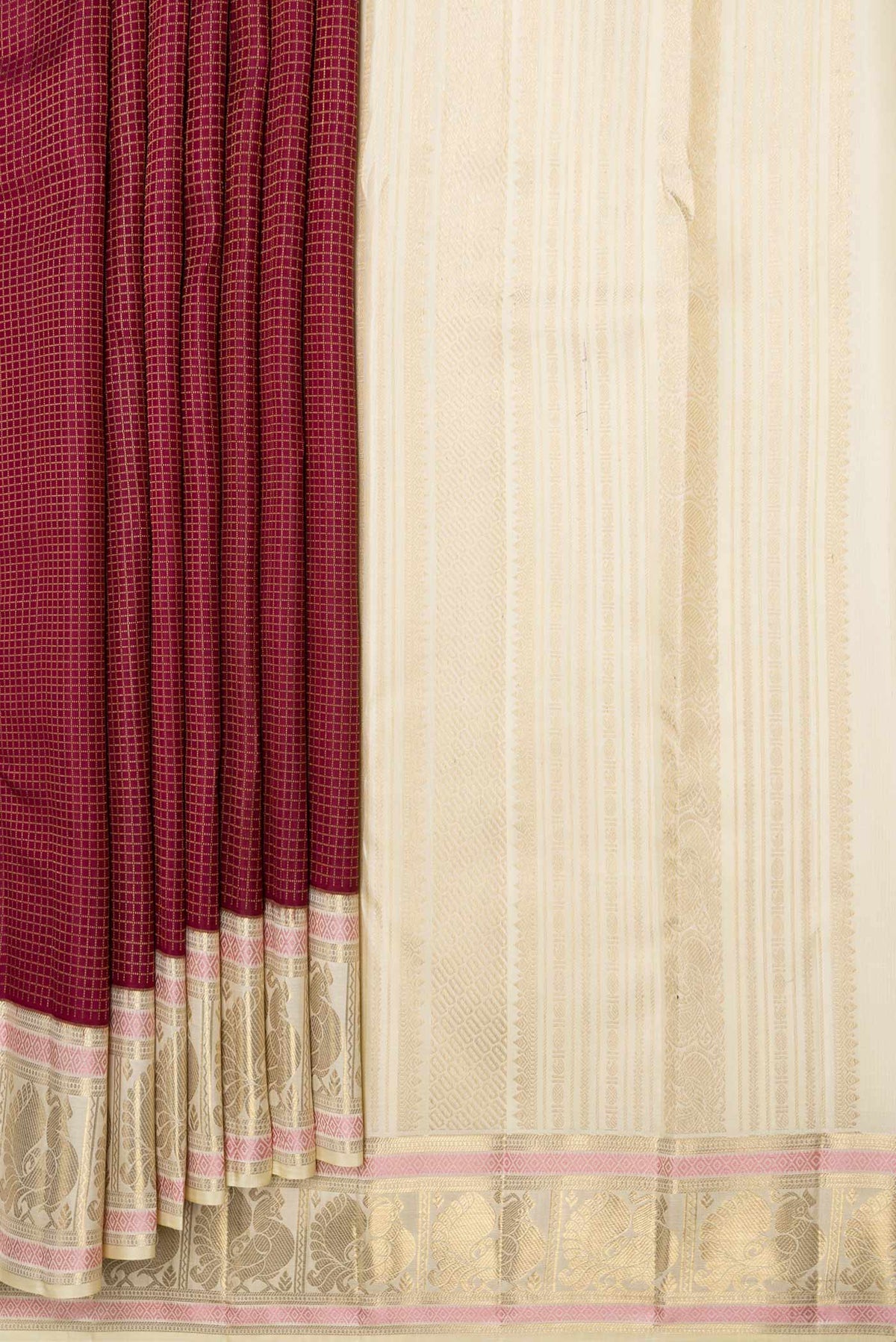 Pleats and pallu of Maroon Dual Tone Kanchipuram Saree with Checked design on the body and Zari Border
