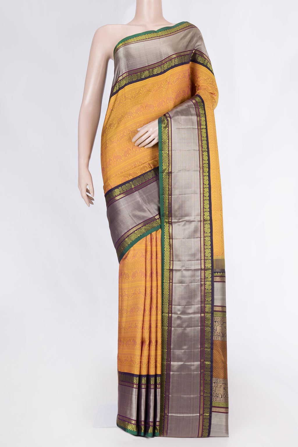 Pure Silk Pure Zari Mustard Dual Tone Kanchipuram Saree with Jacquard design on the body and Zari And Thread Border displayed on a mannequin