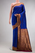 Pure Silk Pure Zari Royal Blue Kanjivaram Saree with Zari Butta on the body and Fancy Border.  displayed on a mannequin